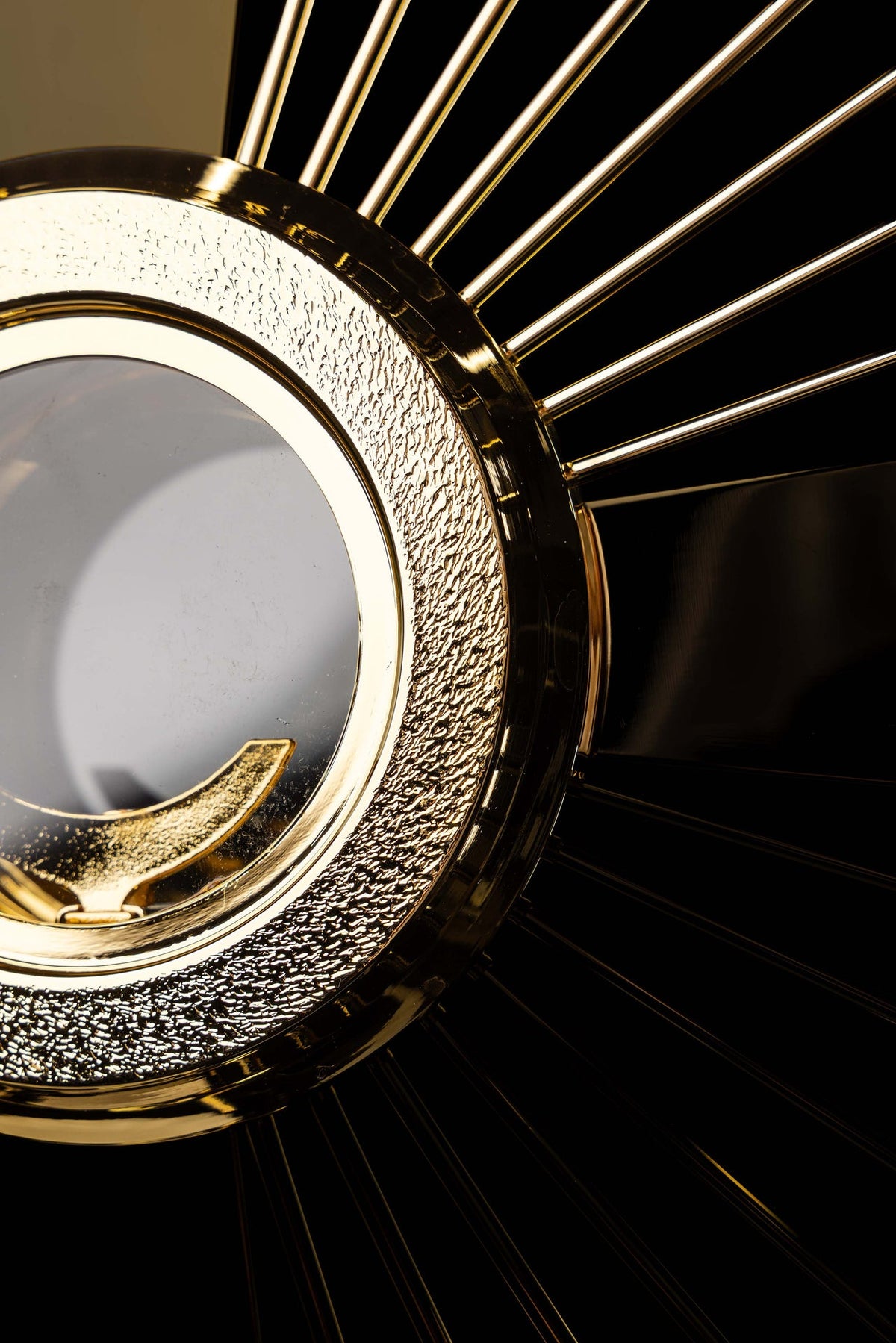 Gold-plated brass monstrance with cross and rays, textured rim detail