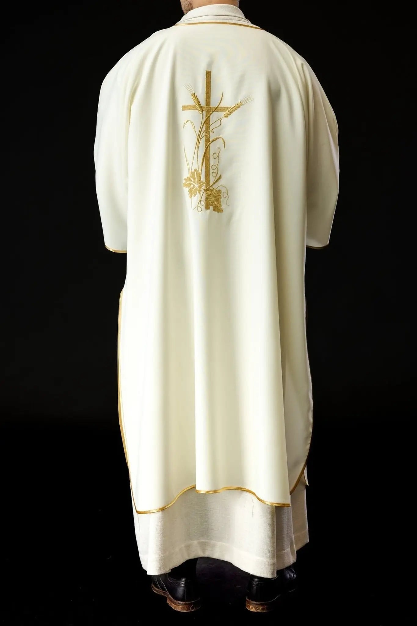 Ecru dalmatica with gold Pax cross embroidery