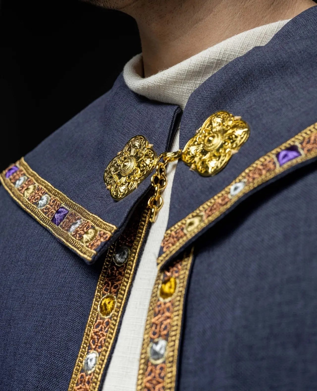 Purple liturgical cape with gold IHS