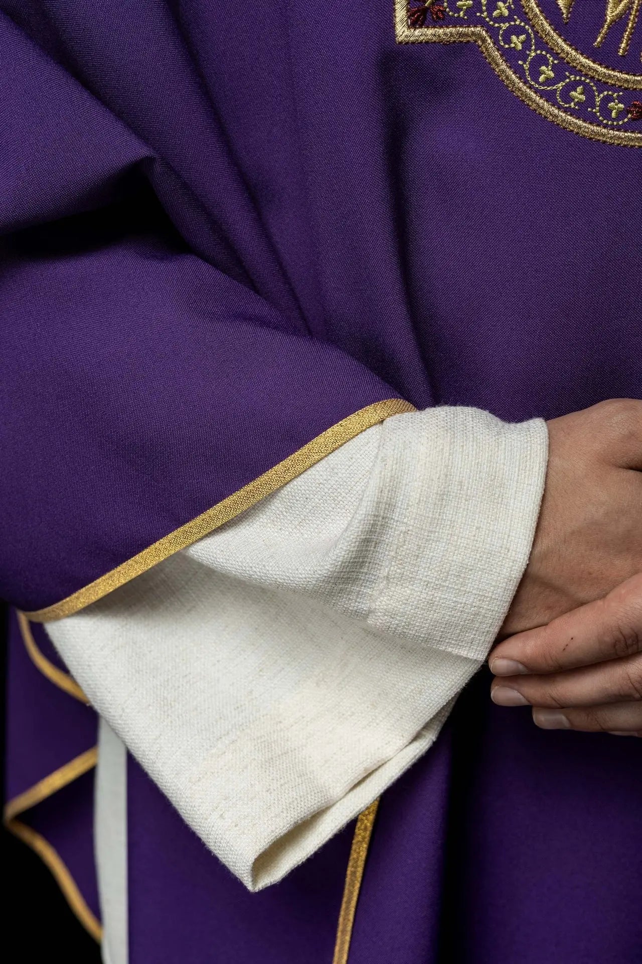 Purple chasuble with IHS and PAX embroidery