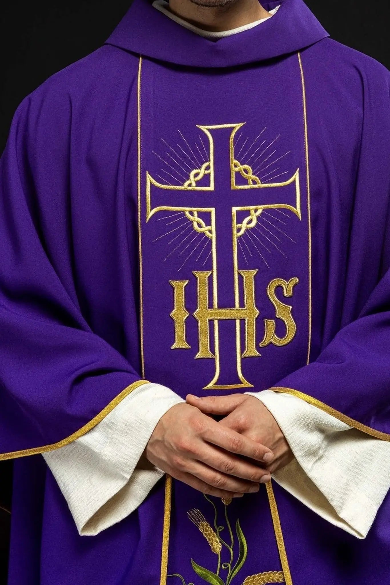 Purple chasuble with decorated gold belt with IHS and ears