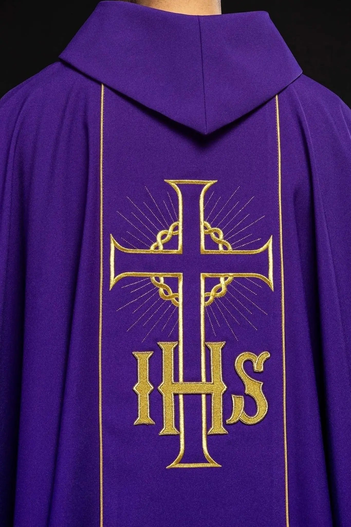Purple chasuble with decorated gold belt with IHS and ears