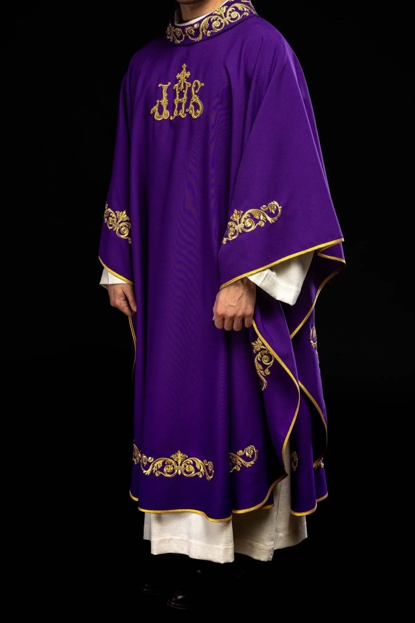 Purple chasuble with gold IHS embroidery and decorative trim