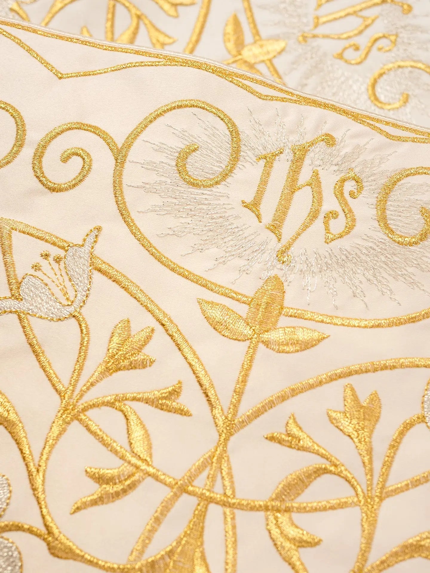 Metre with IHS monogram in ecru