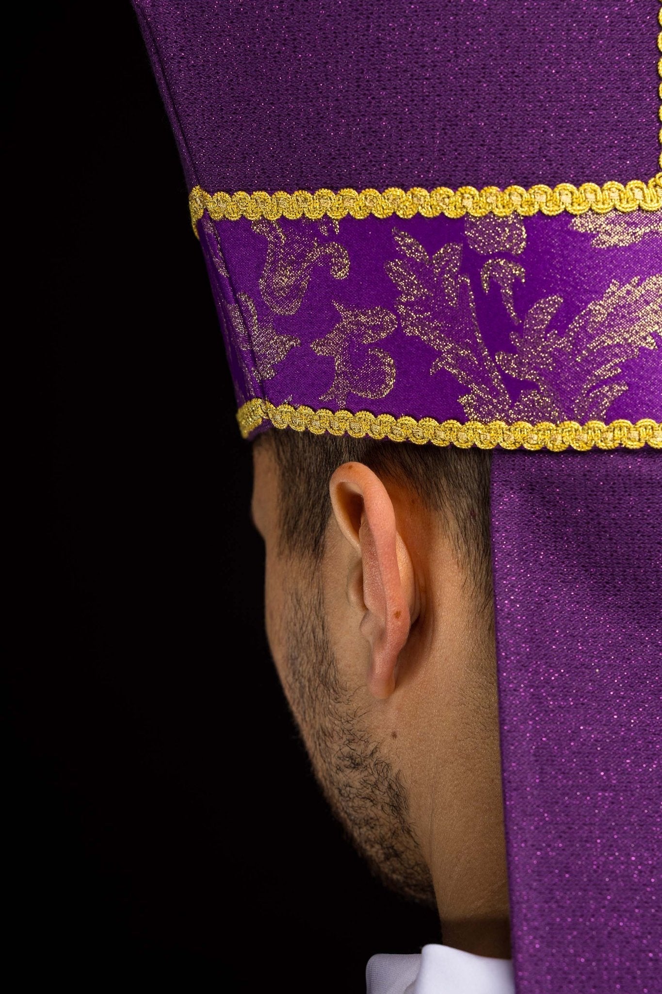 Purple mitre with embroidered cross and jacquard fabric