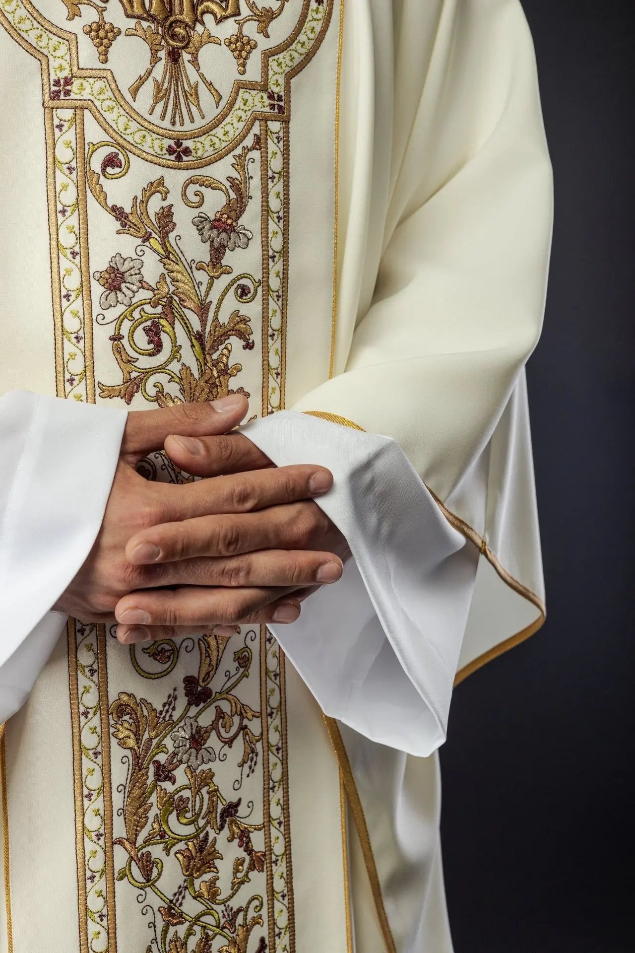 Richly decorated chasuble with IHS motif in ecru colour
