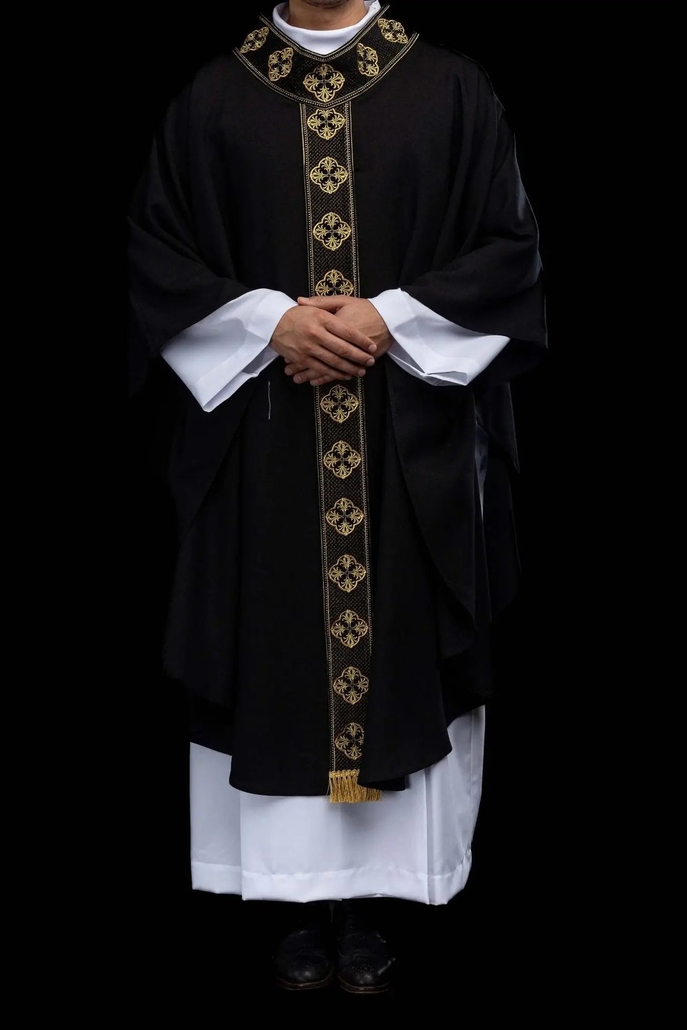 Black chasuble with embroidered band and collar with crosses