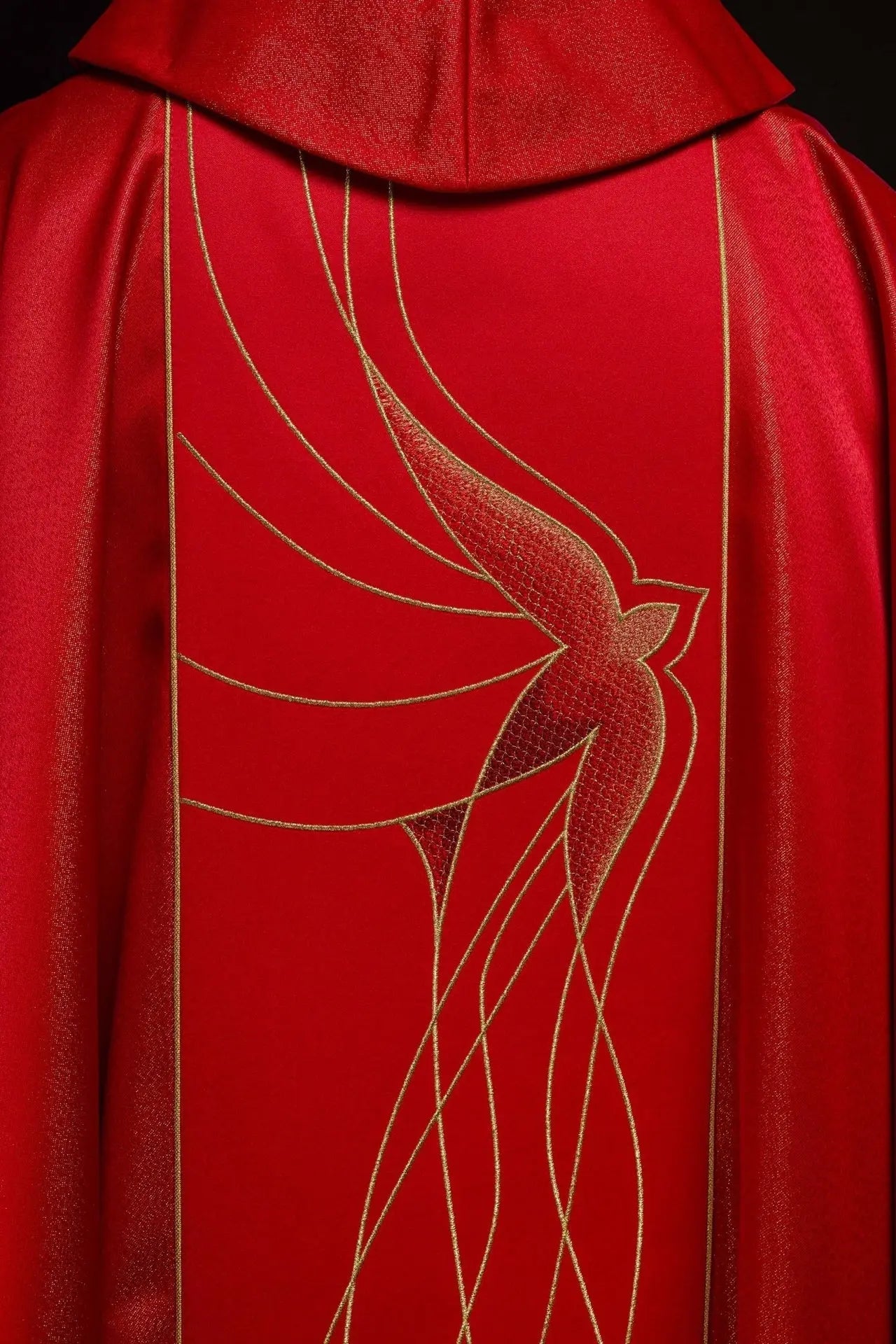 Chasuble of shiny fabric richly embroidered in red
