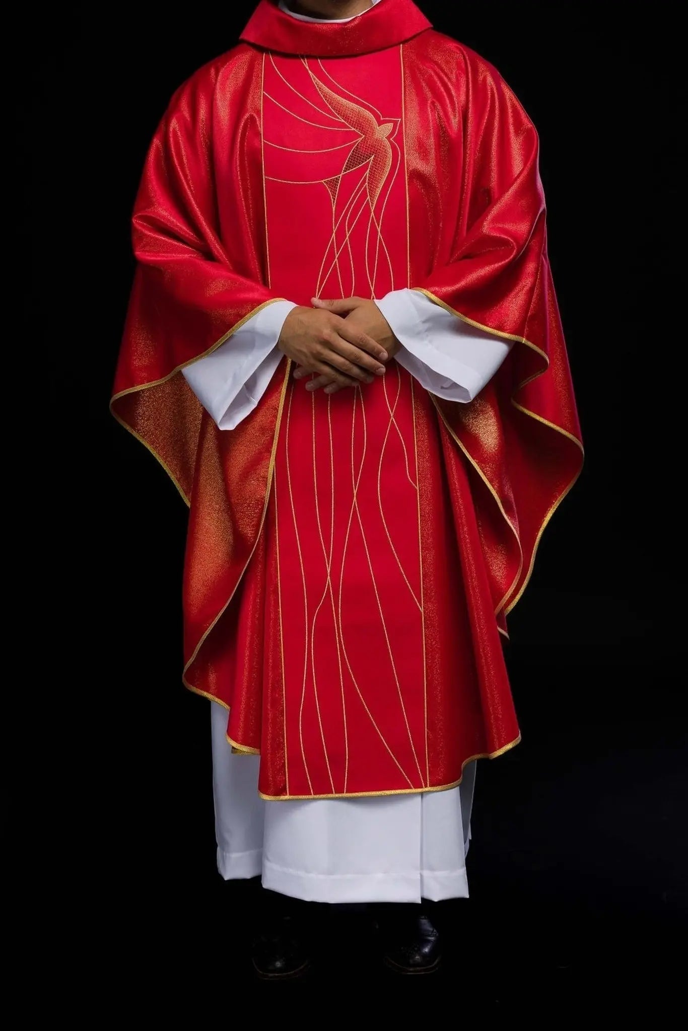 Chasuble of shiny fabric richly embroidered in red
