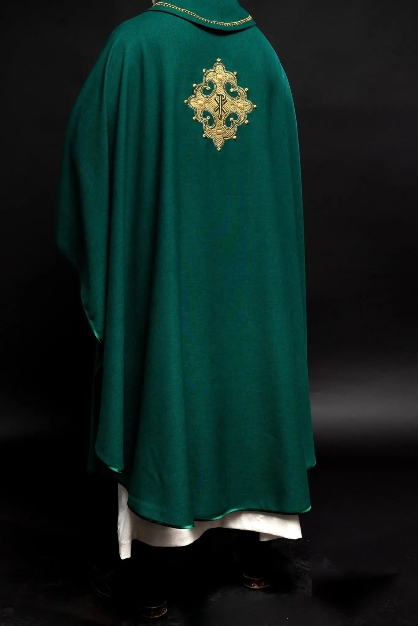 Chasuble with embroidered cross and gold trim on collar in green