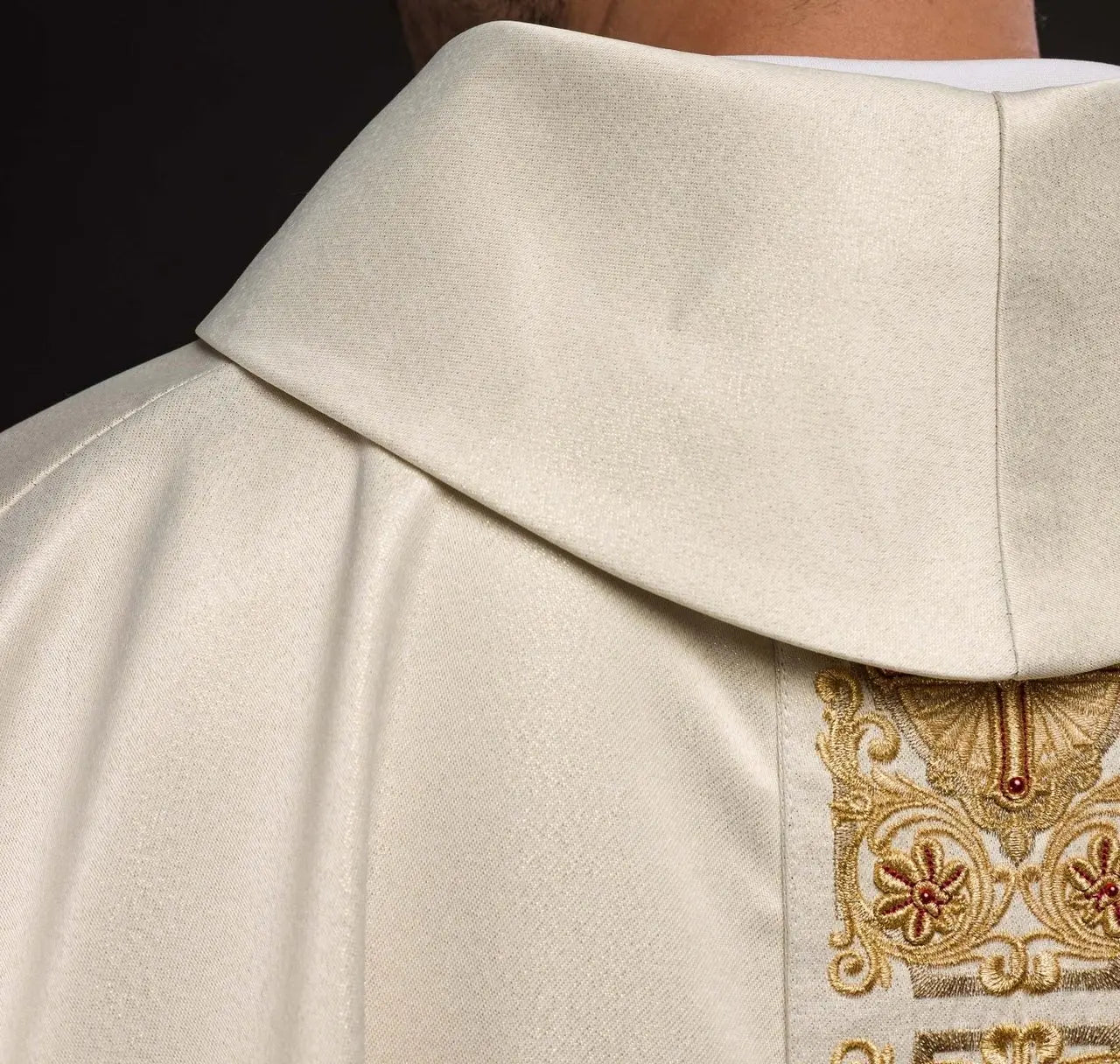 Gold chasuble richly embroidered decorated with stones