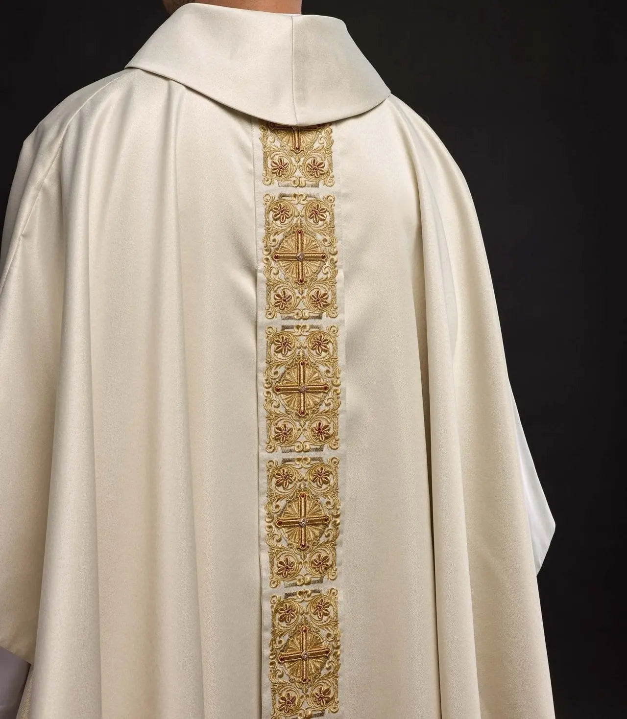 Gold chasuble richly embroidered decorated with stones