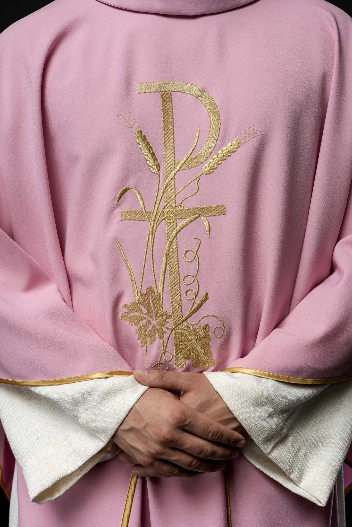 Pink chasuble with gold cross embroidery