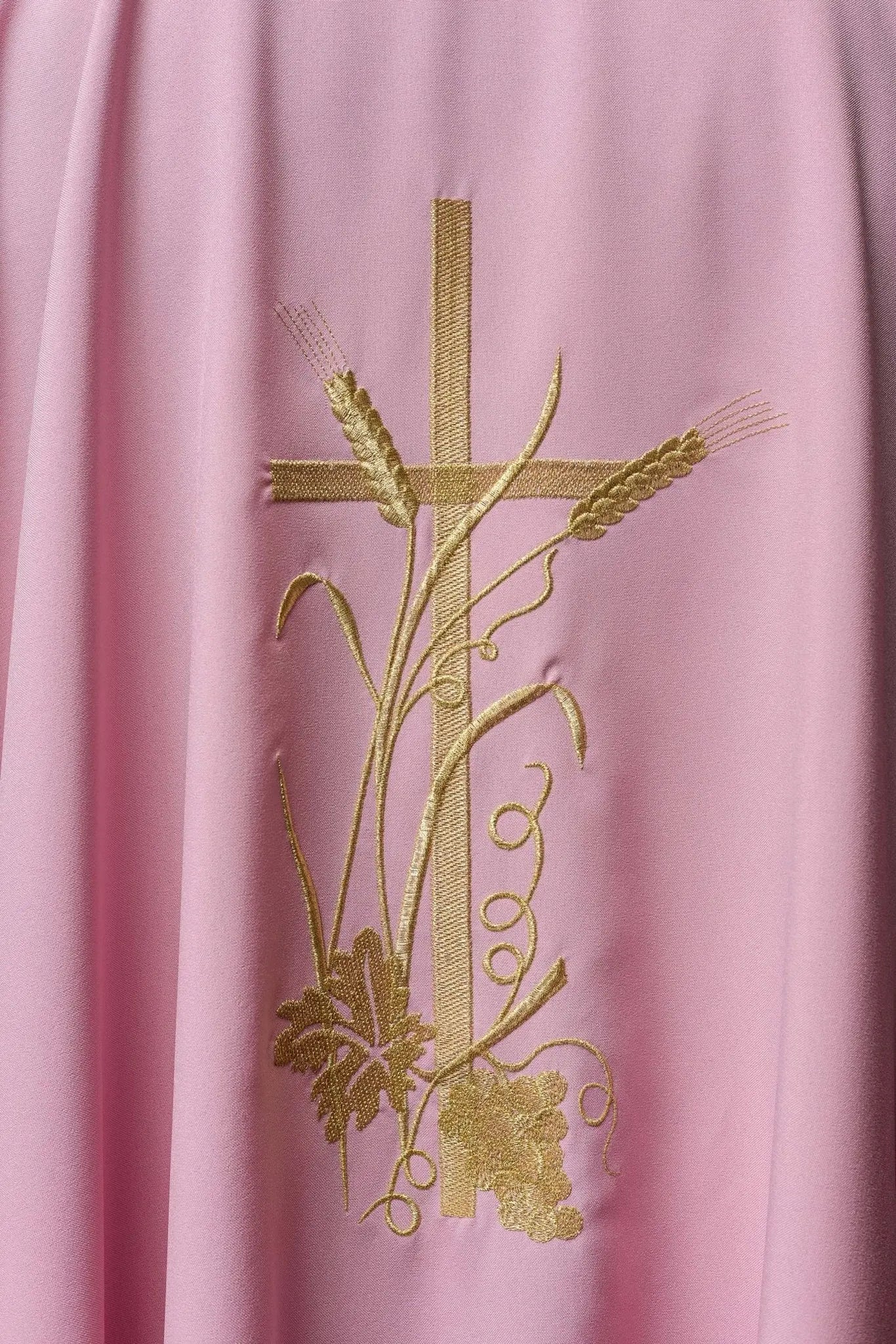 Pink chasuble with gold cross embroidery