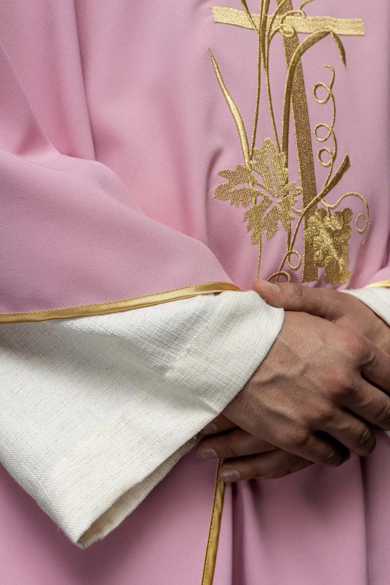 Pink chasuble with gold cross embroidery