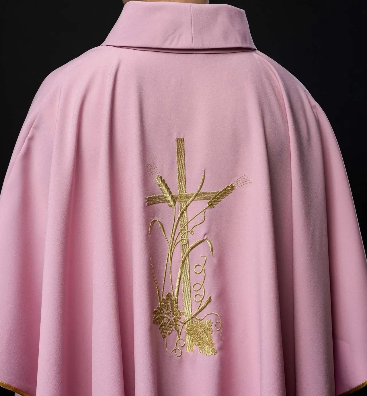 Pink chasuble with gold cross embroidery