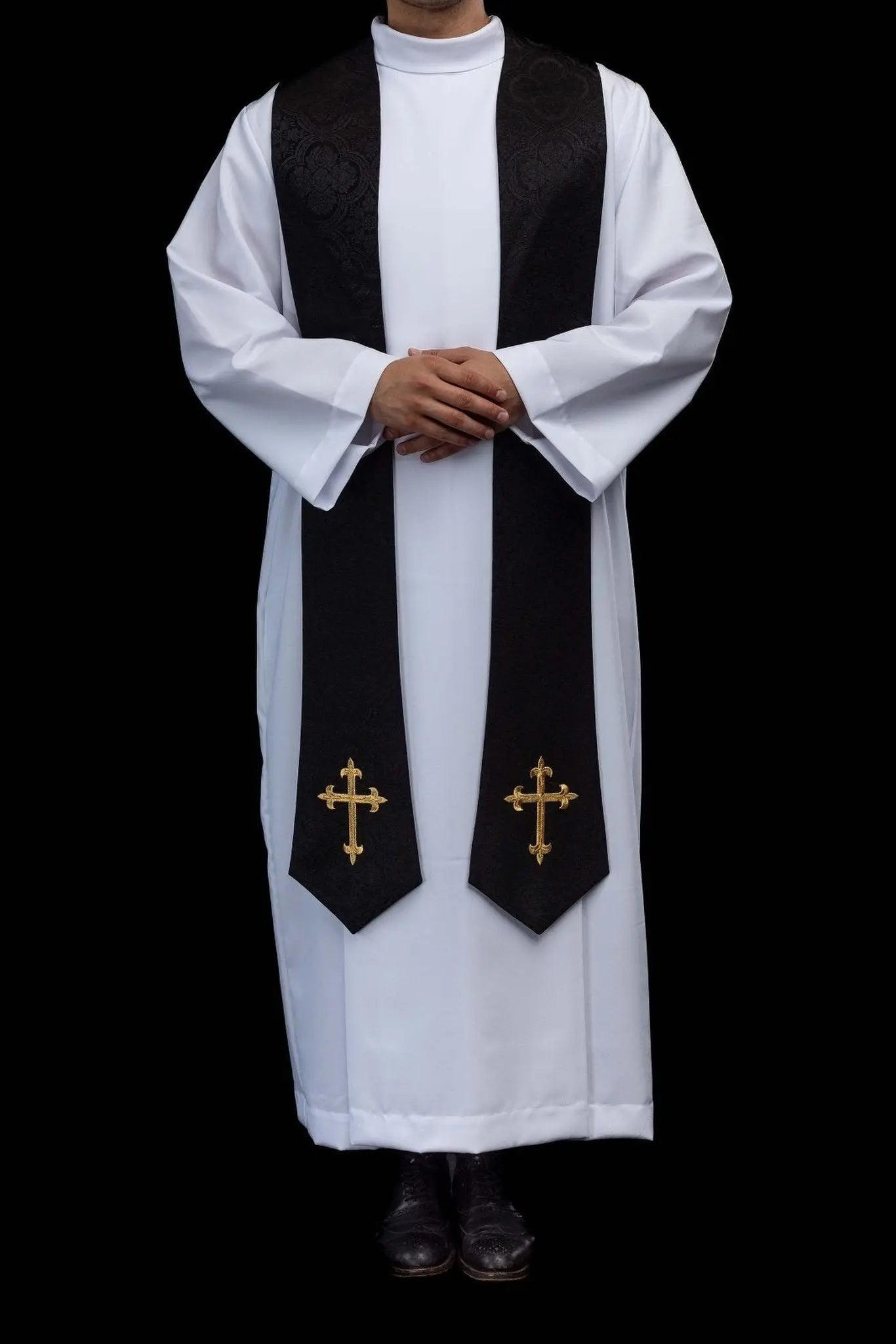 Black jacquard stole with embroidered gold crosses for liturgical use.
