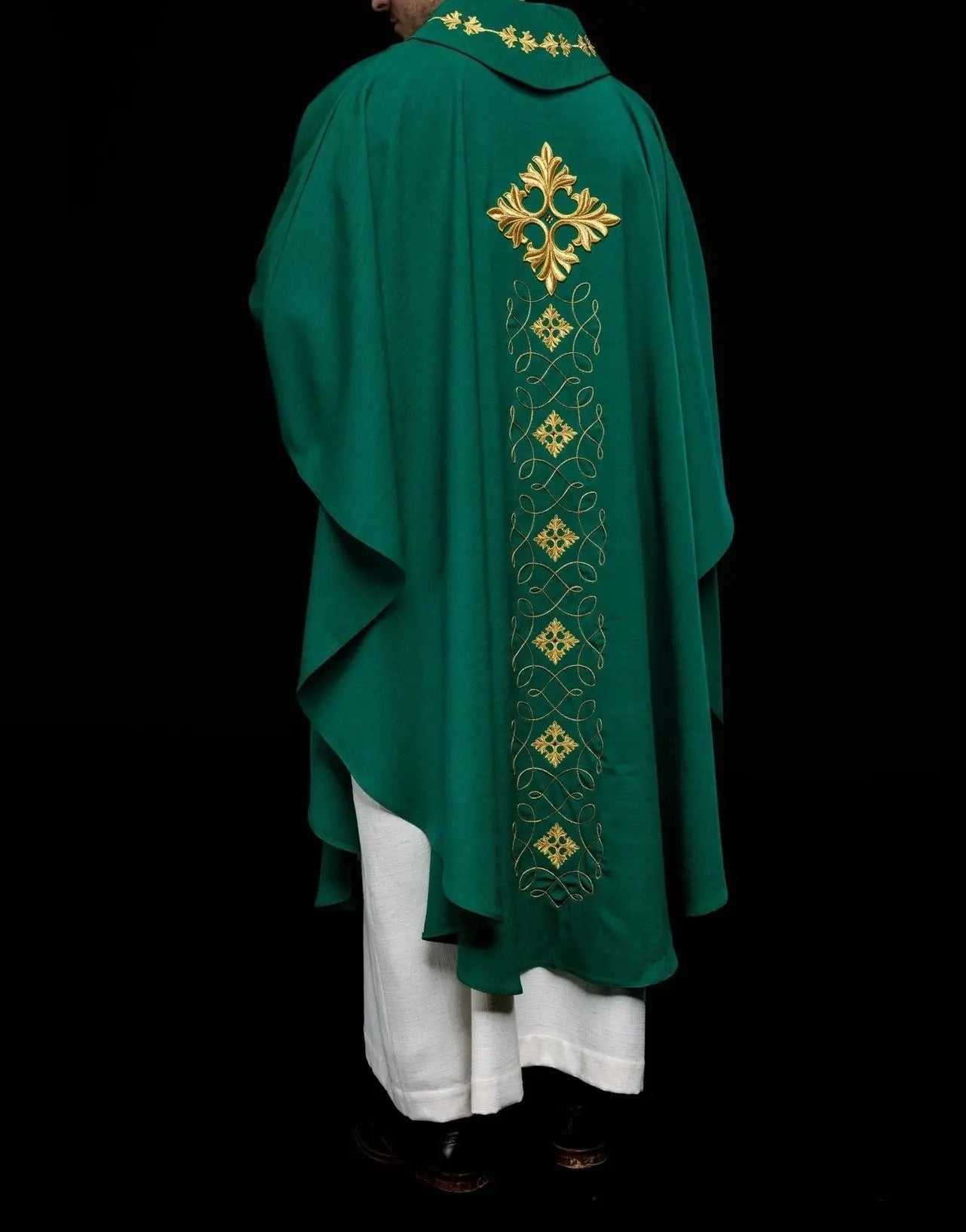 Green chasuble richly embroidered with string and stones