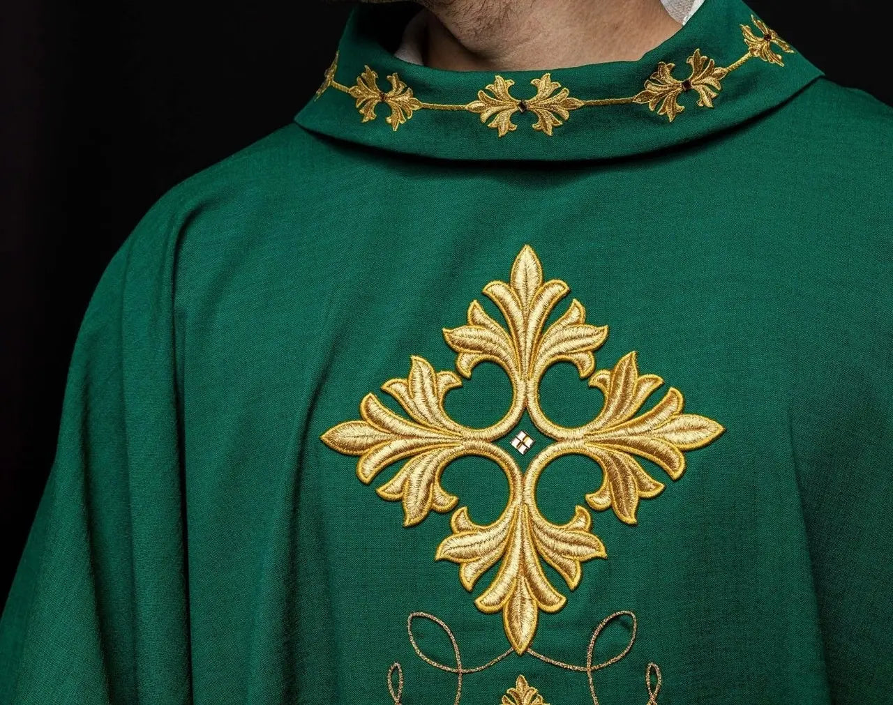 Green chasuble richly embroidered with string and stones