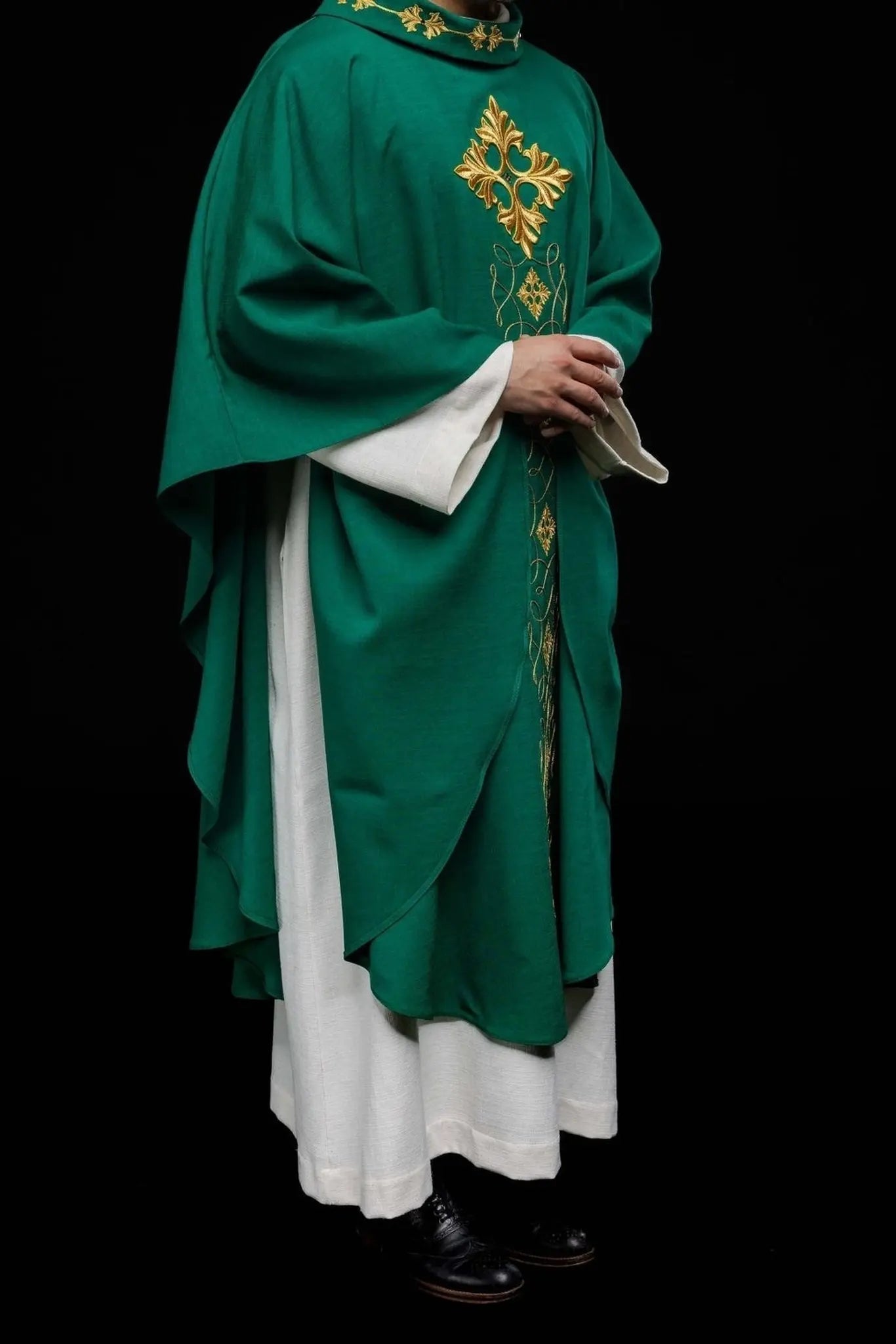 Green chasuble richly embroidered with string and stones
