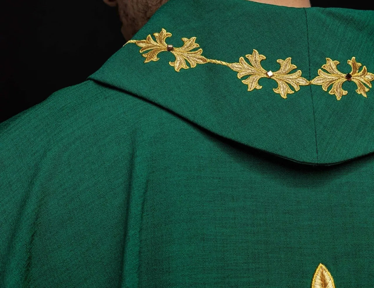 Green chasuble richly embroidered with string and stones