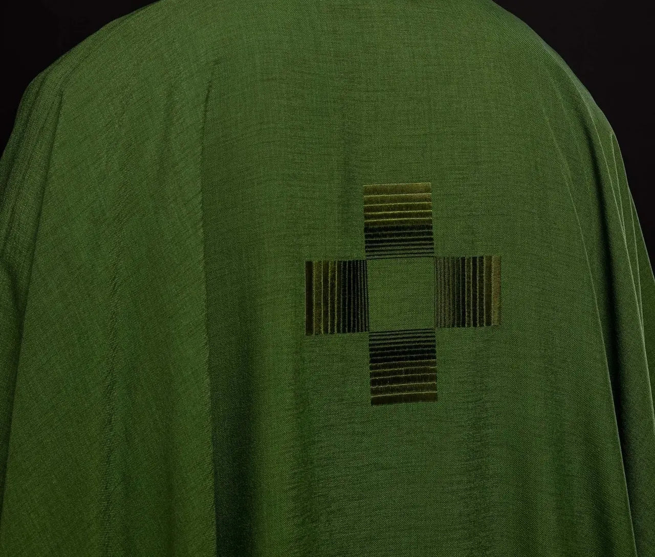 Green chasuble with embroidered crosses