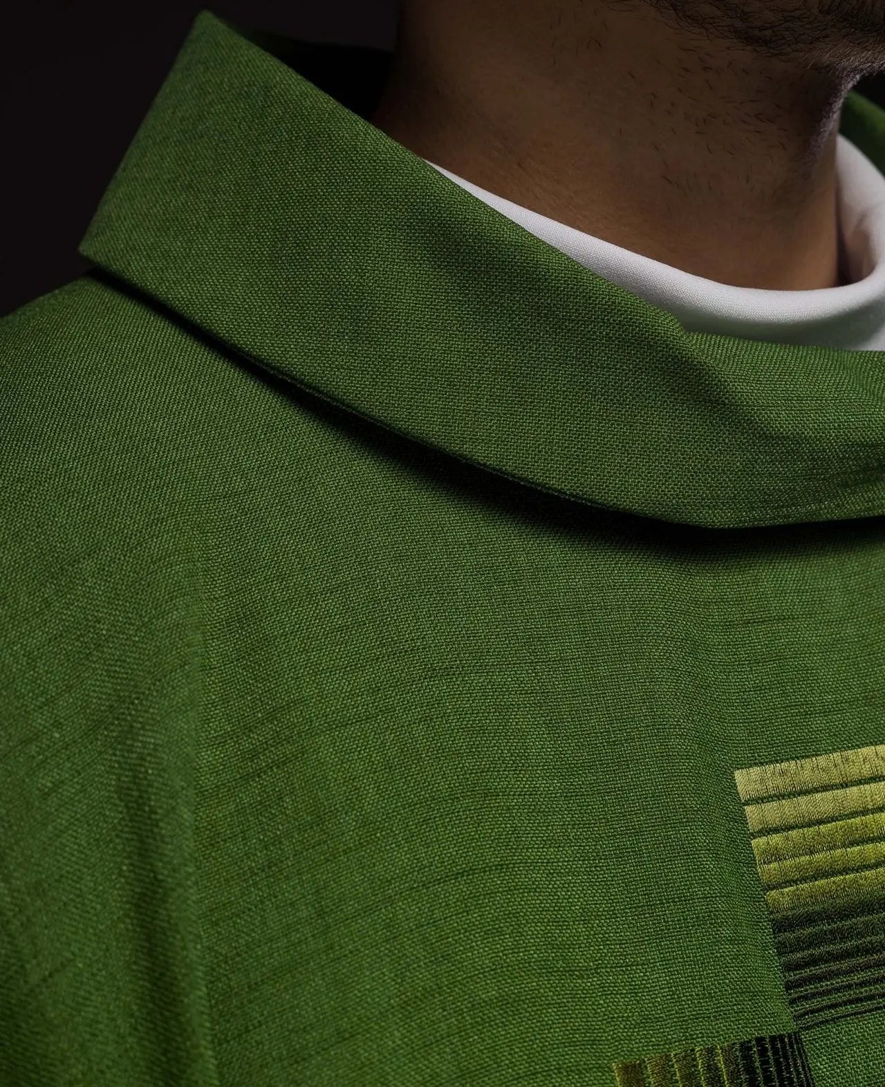 Green chasuble with embroidered crosses