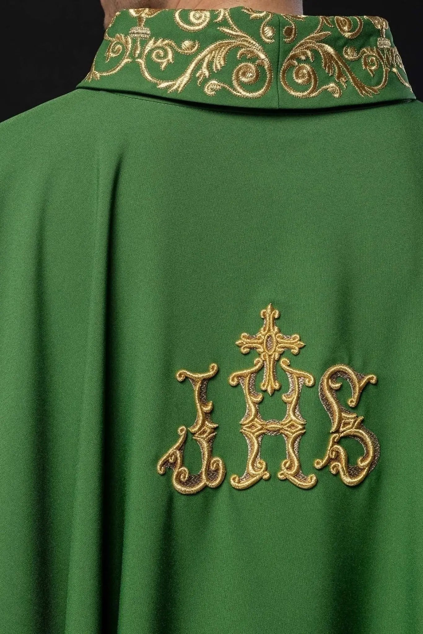 Green chasuble with gold IHS embroidery and decorative trim