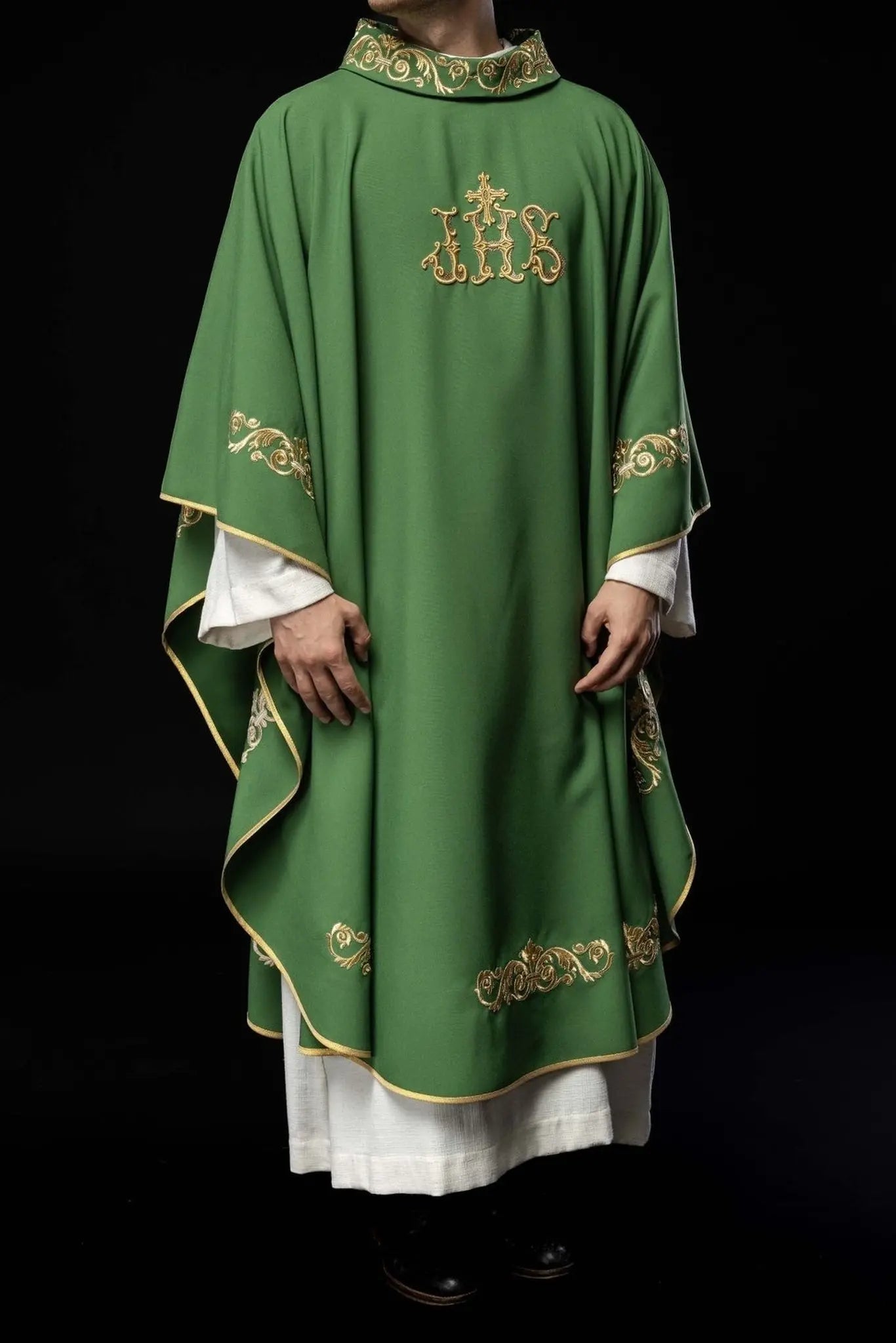 Green chasuble with gold IHS embroidery and decorative trim
