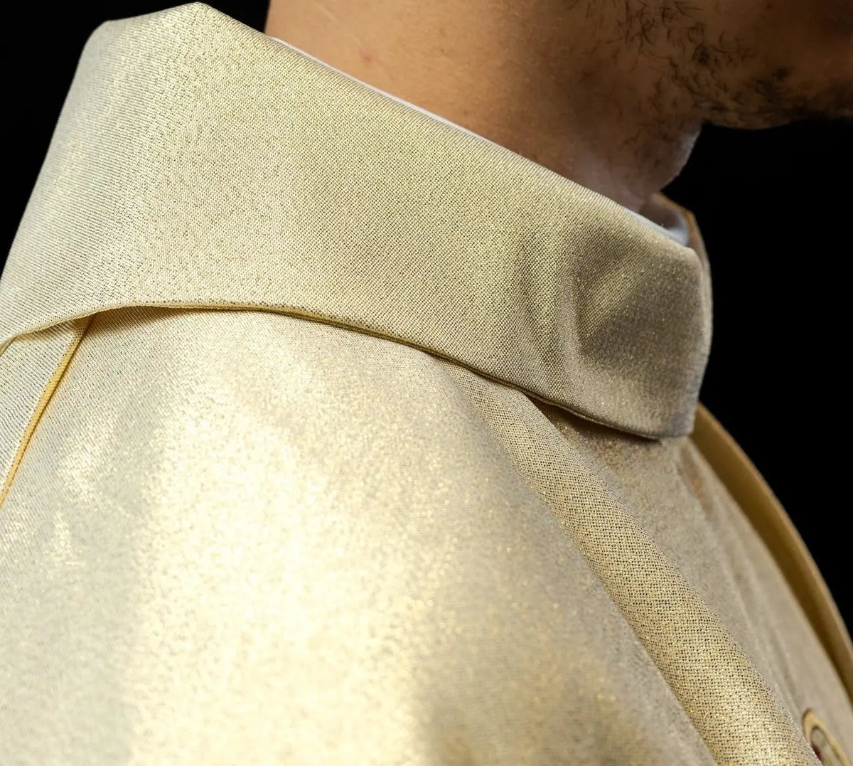 Gold chasuble with IHS and PAX embroidery