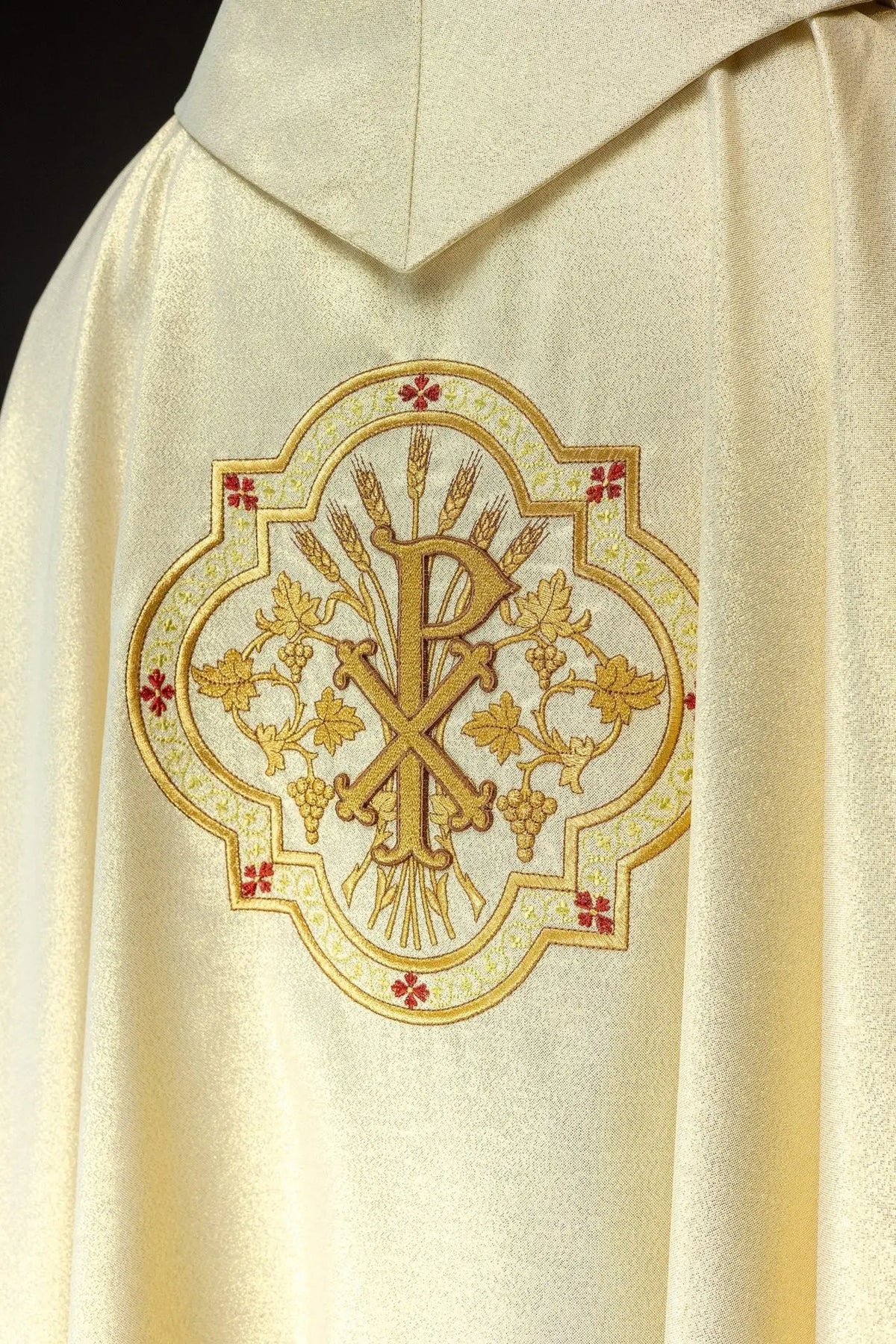 Gold chasuble with IHS and PAX embroidery