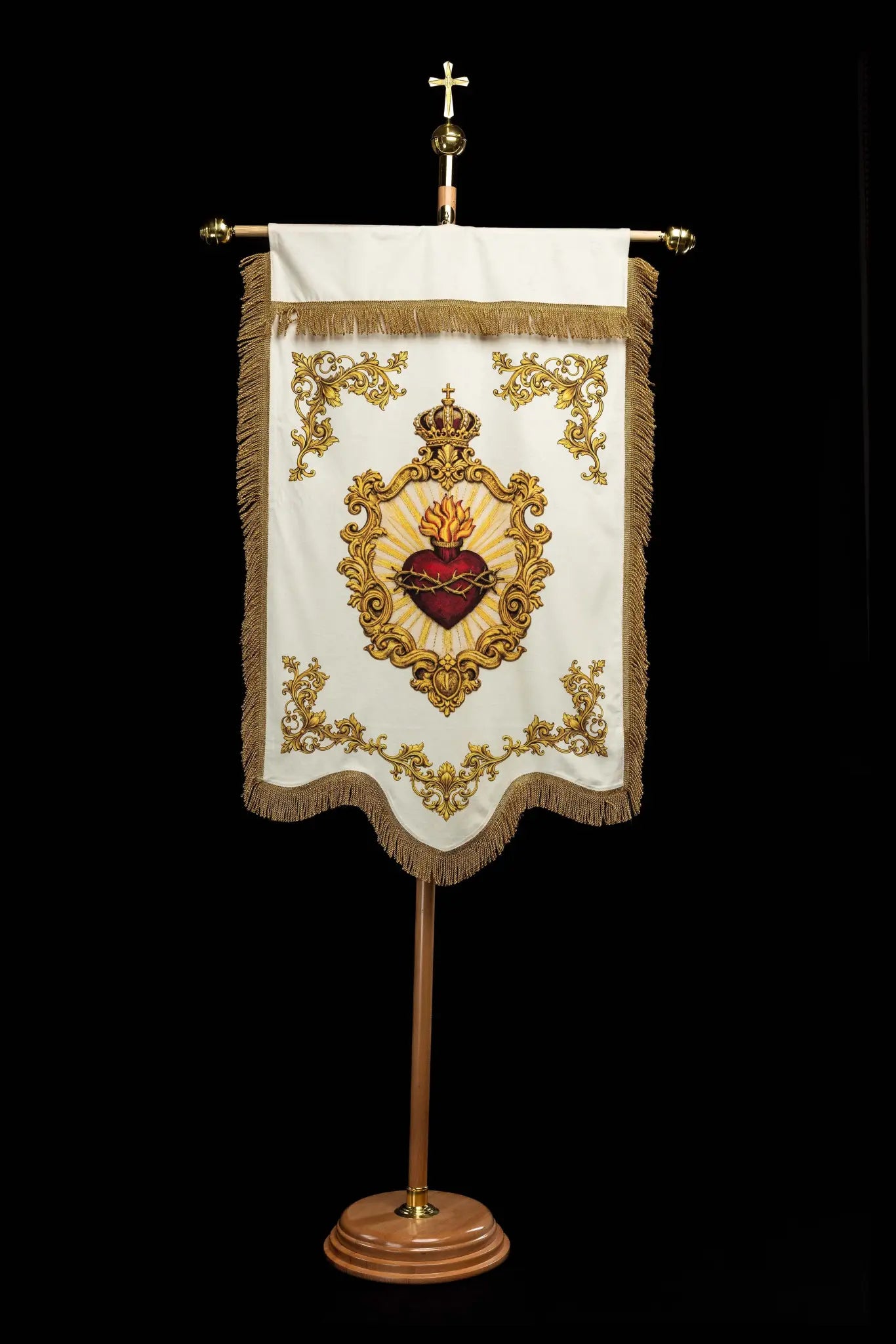 Double-sided printed processional banner featuring the Sacred Heart of Jesus on one side and the IHS symbol on the other, with gold ornamentation.
