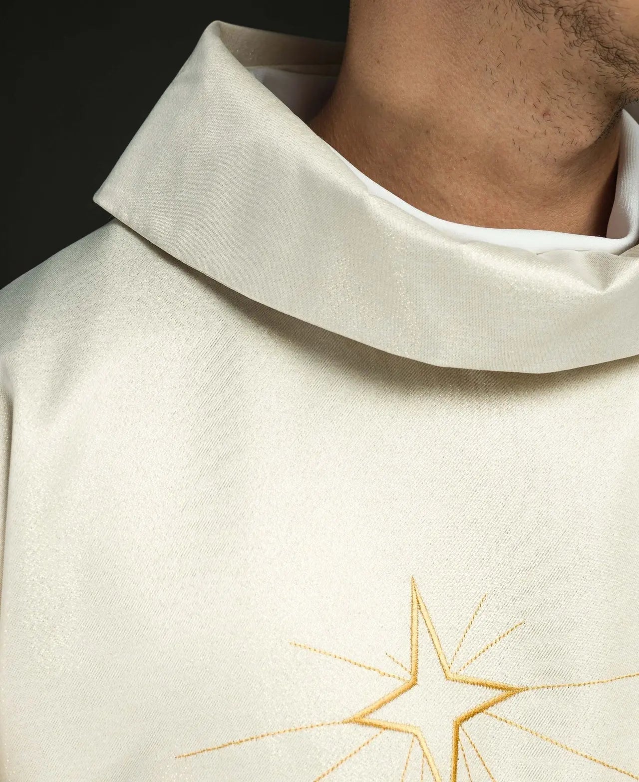 Glittering chasuble with gold embroidery and image of the Three Kings