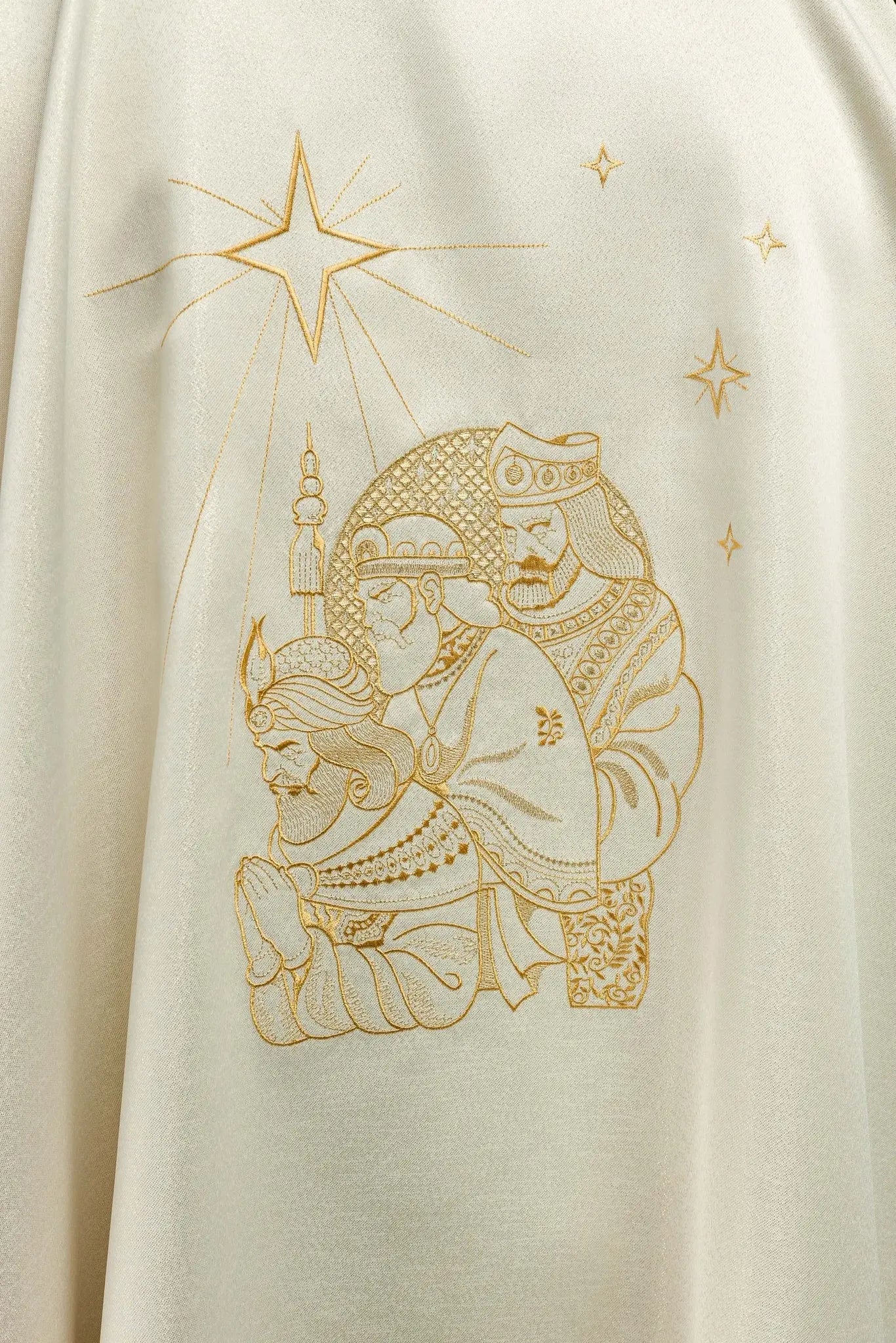 Glittering chasuble with gold embroidery and image of the Three Kings
