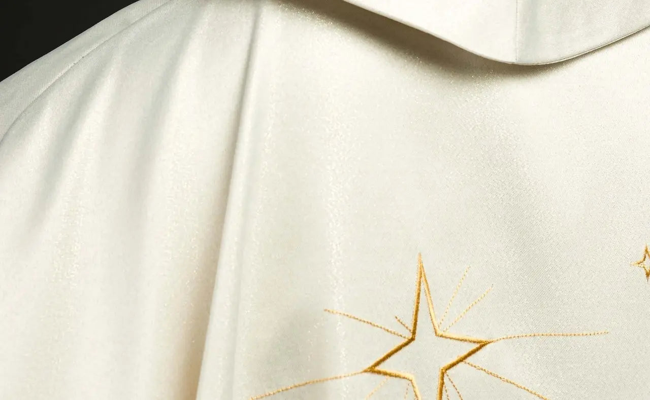 Glittering chasuble with gold embroidery and image of the Three Kings