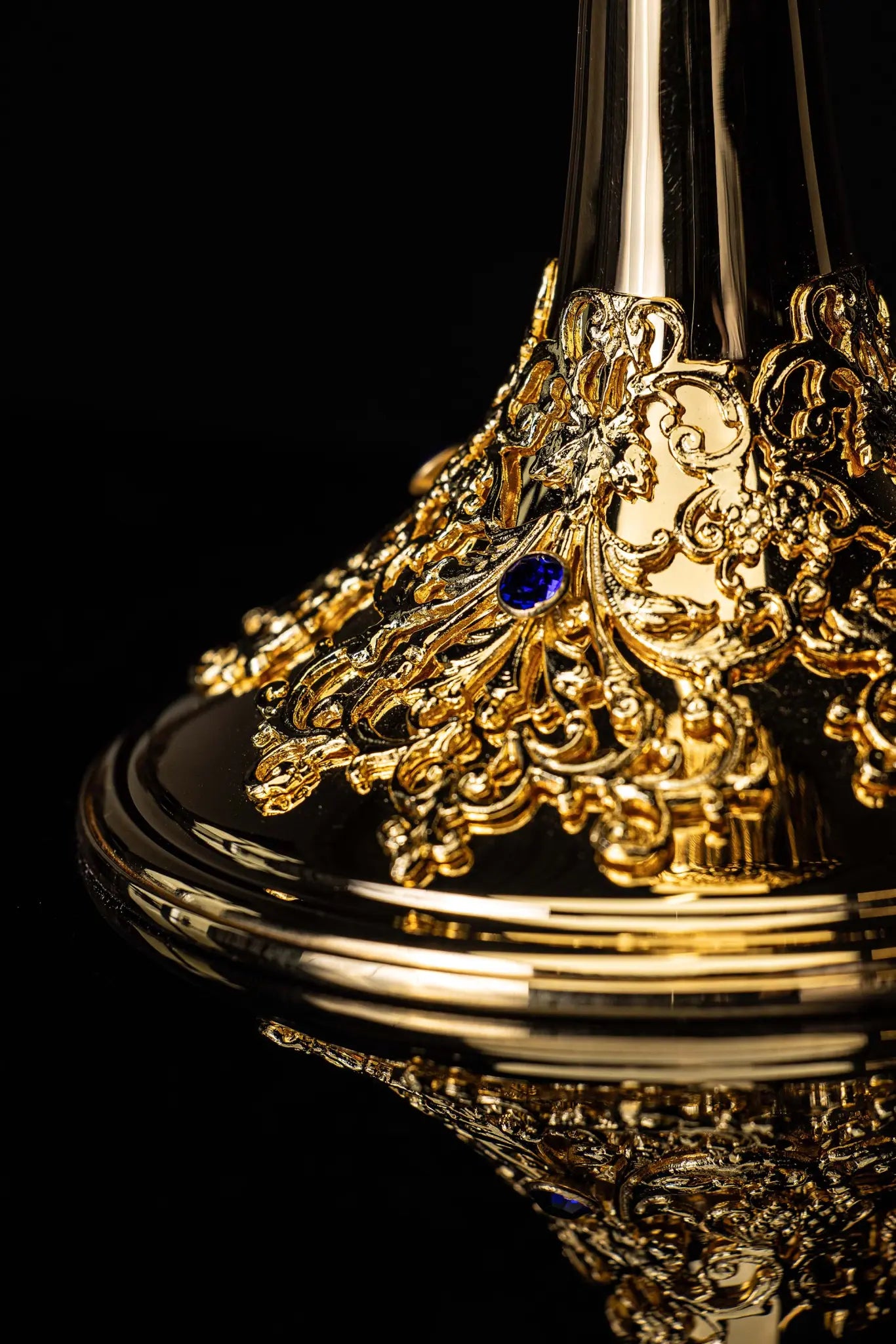 Handmade gold-plated chalice with floral ornamentation on the cup, knop, and base, adorned with blue imitation sapphires.