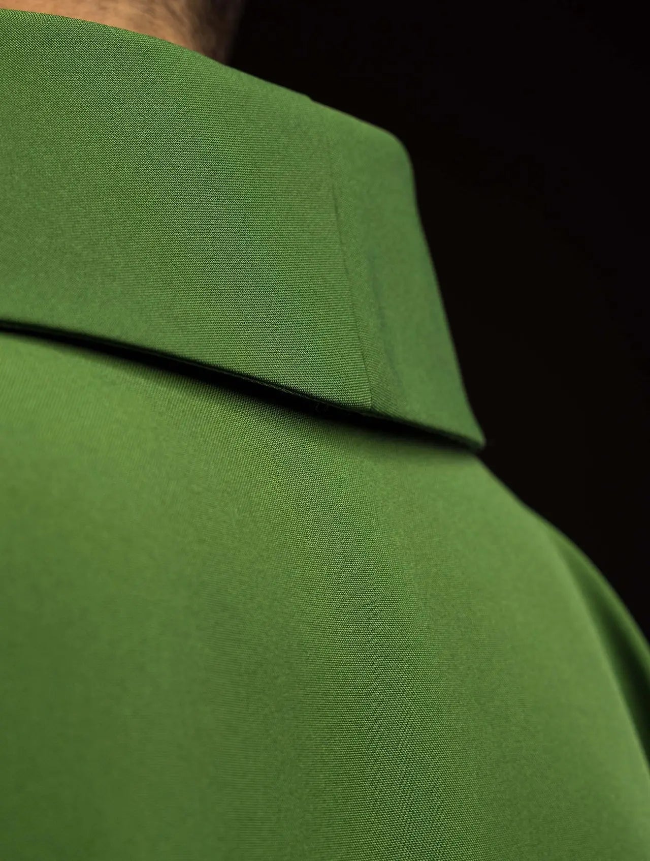 Green chasuble embroidered with cross motif