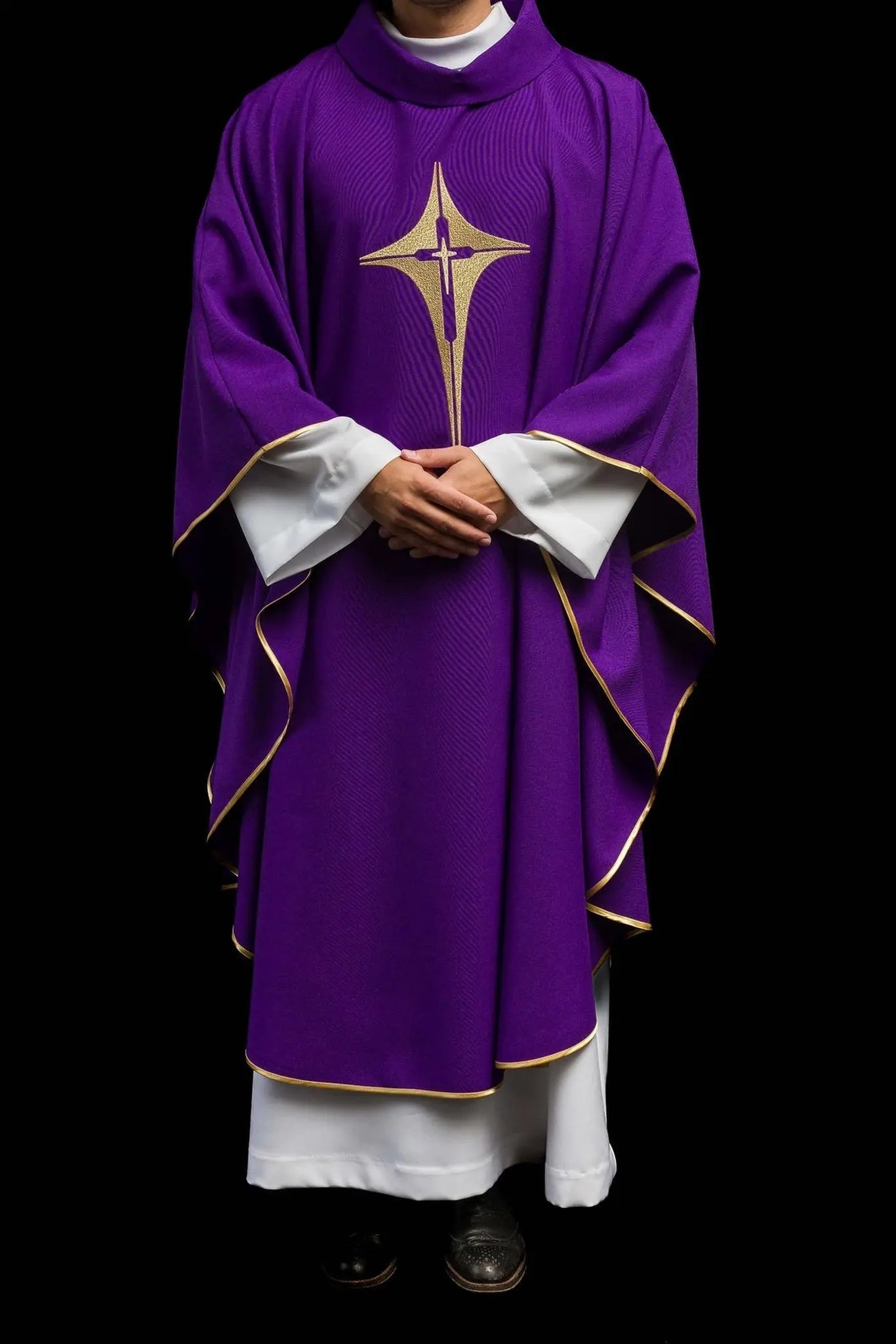 Purple chasuble embroidered with cross motif
