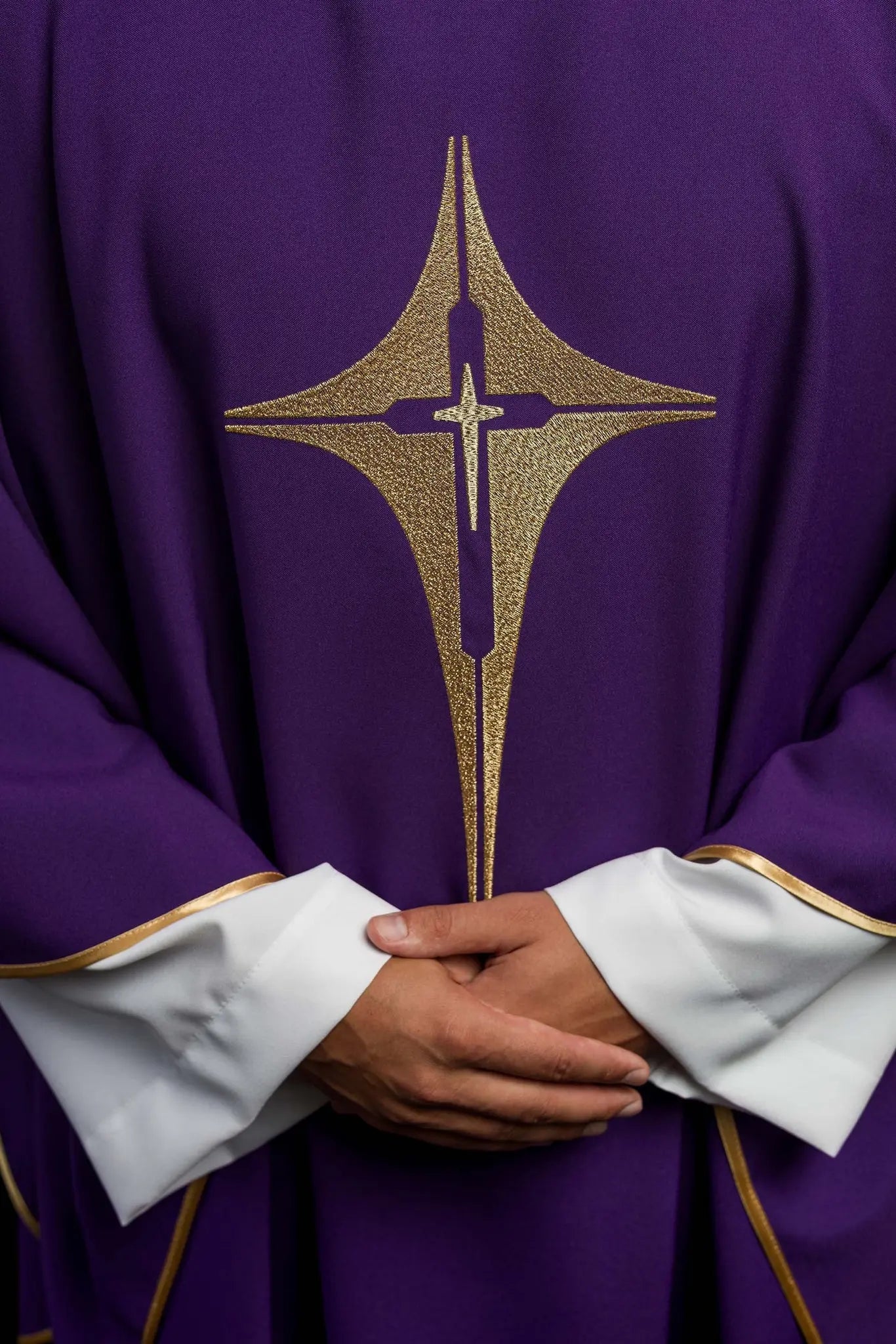 Purple chasuble embroidered with cross motif