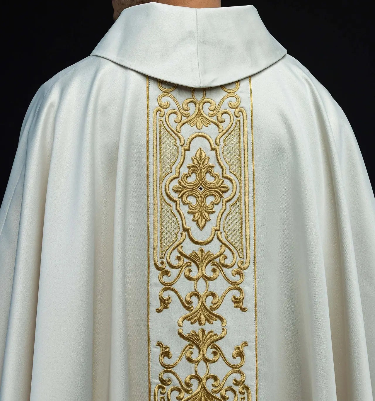 Shimmering fabric chasuble with rich gold embroidery on the belt