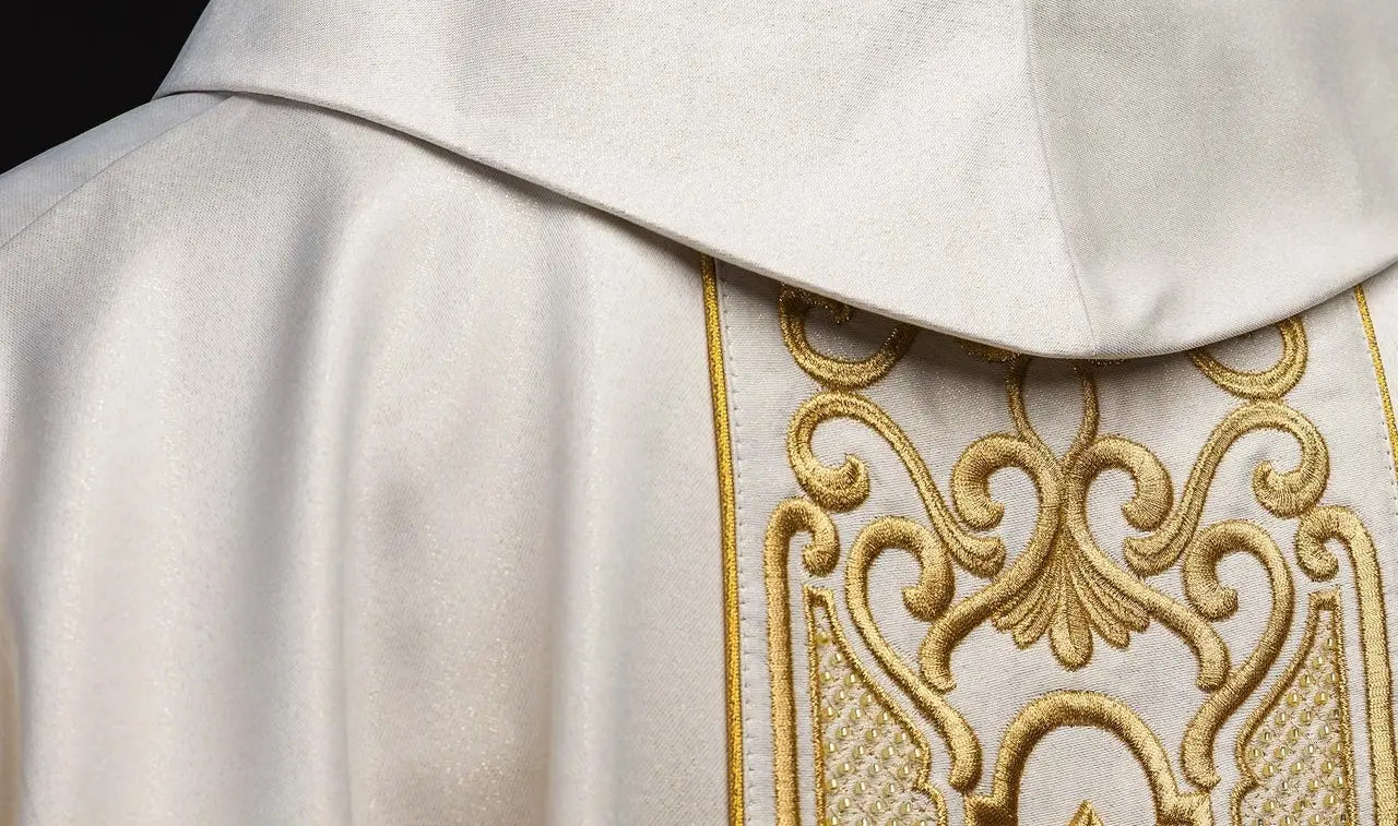 Shimmering fabric chasuble with rich gold embroidery on the belt