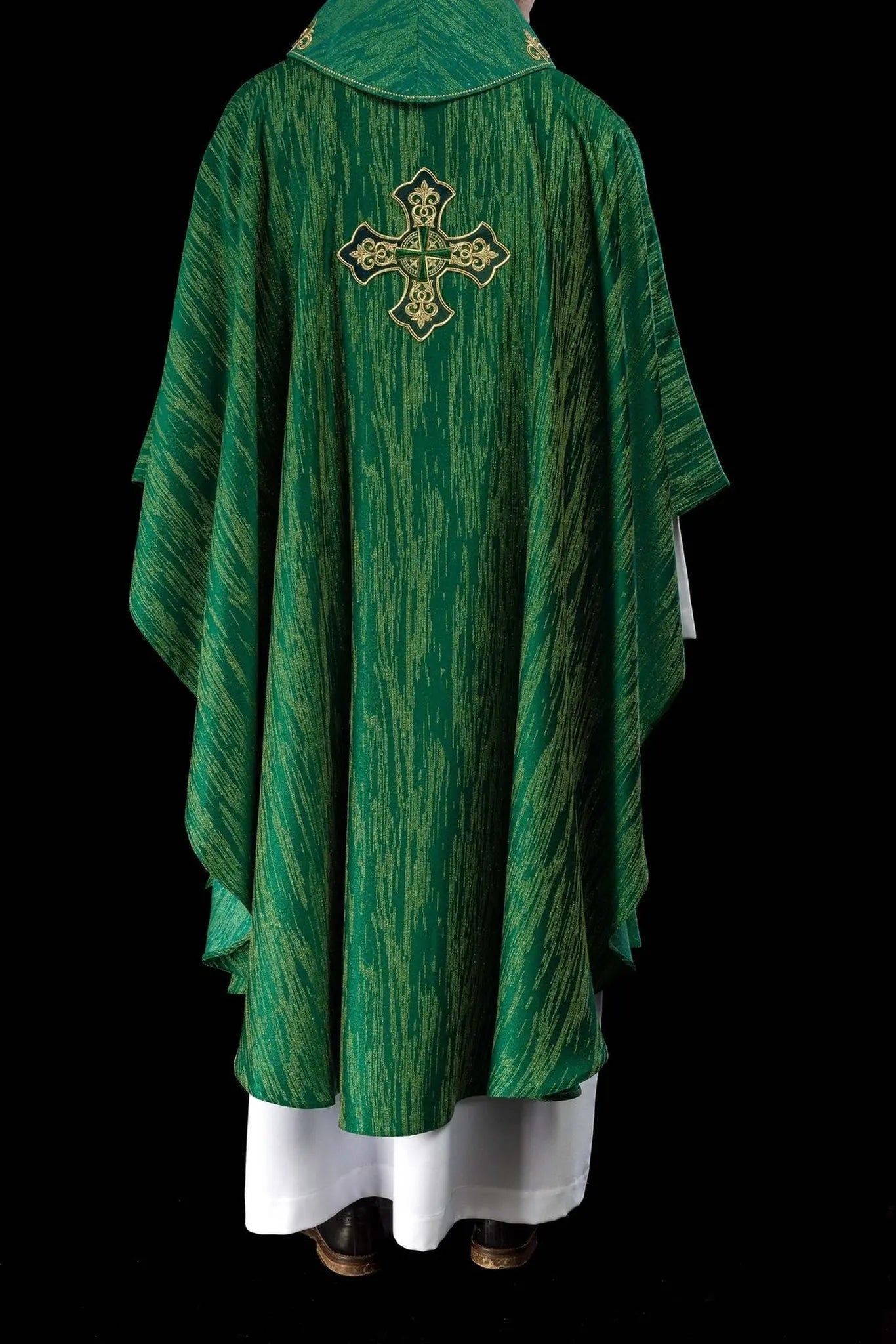 Green chasuble with richly embroidered cross and decorated collar