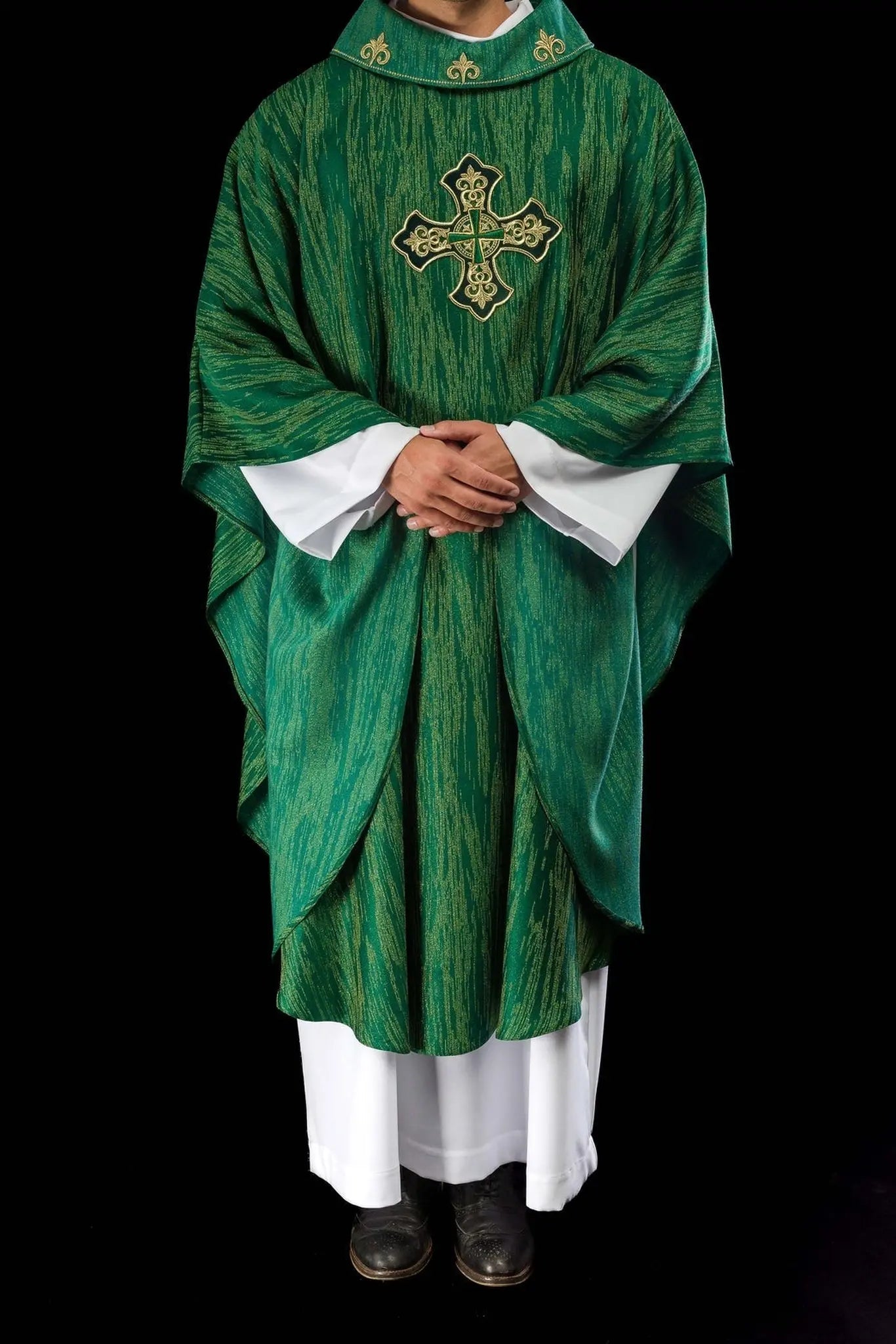 Green chasuble with richly embroidered cross and decorated collar