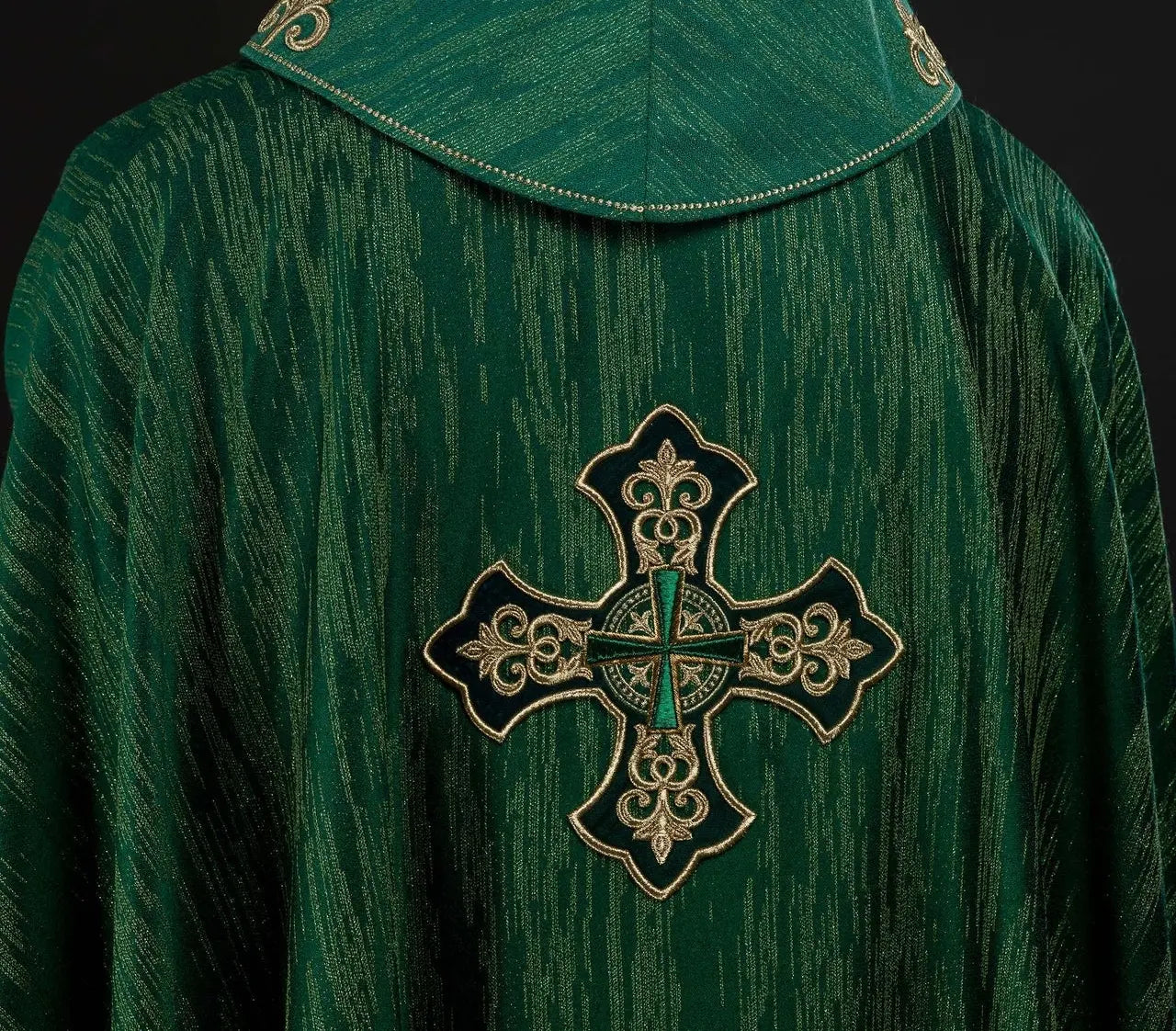 Green chasuble with richly embroidered cross and decorated collar
