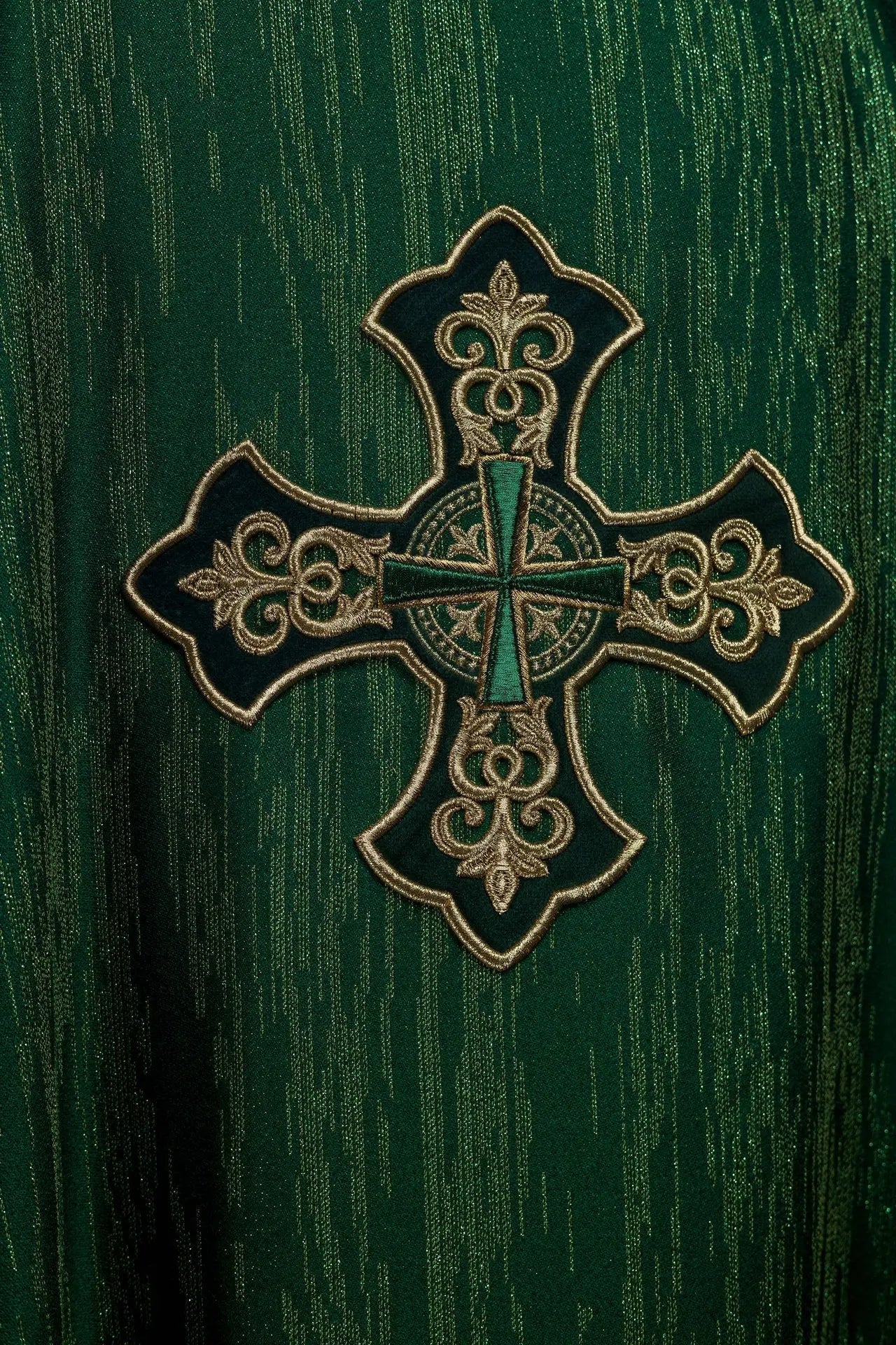 Green chasuble with richly embroidered cross and decorated collar