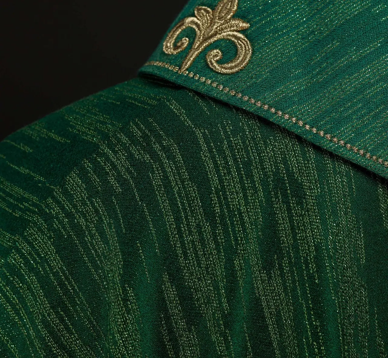 Green chasuble with richly embroidered cross and decorated collar