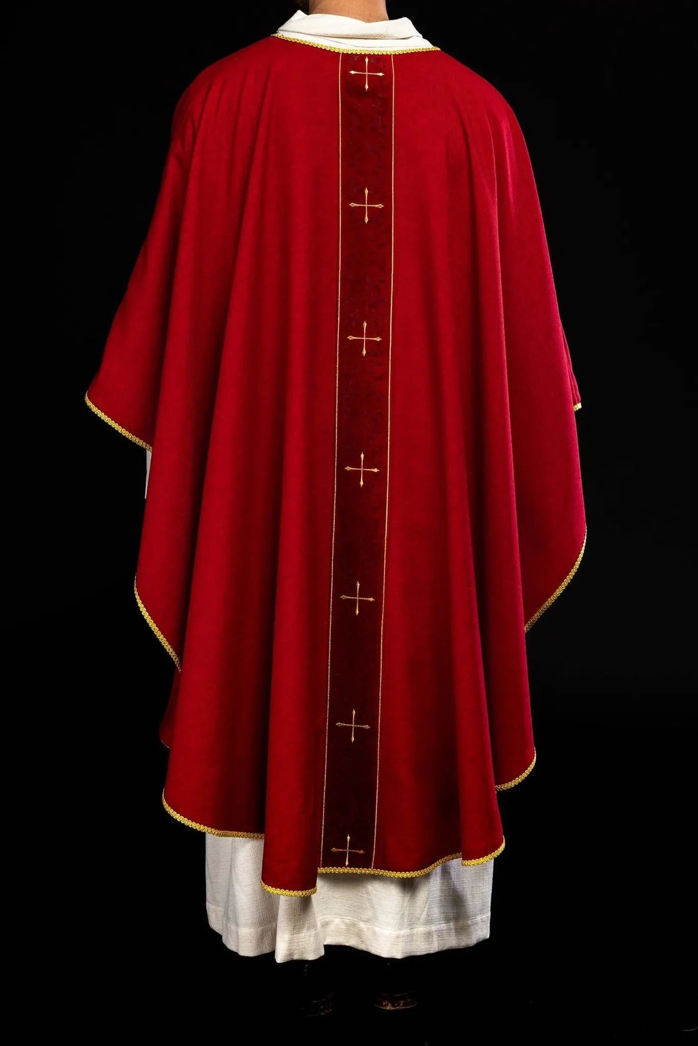 Red chasuble with an embroidered band of crosses