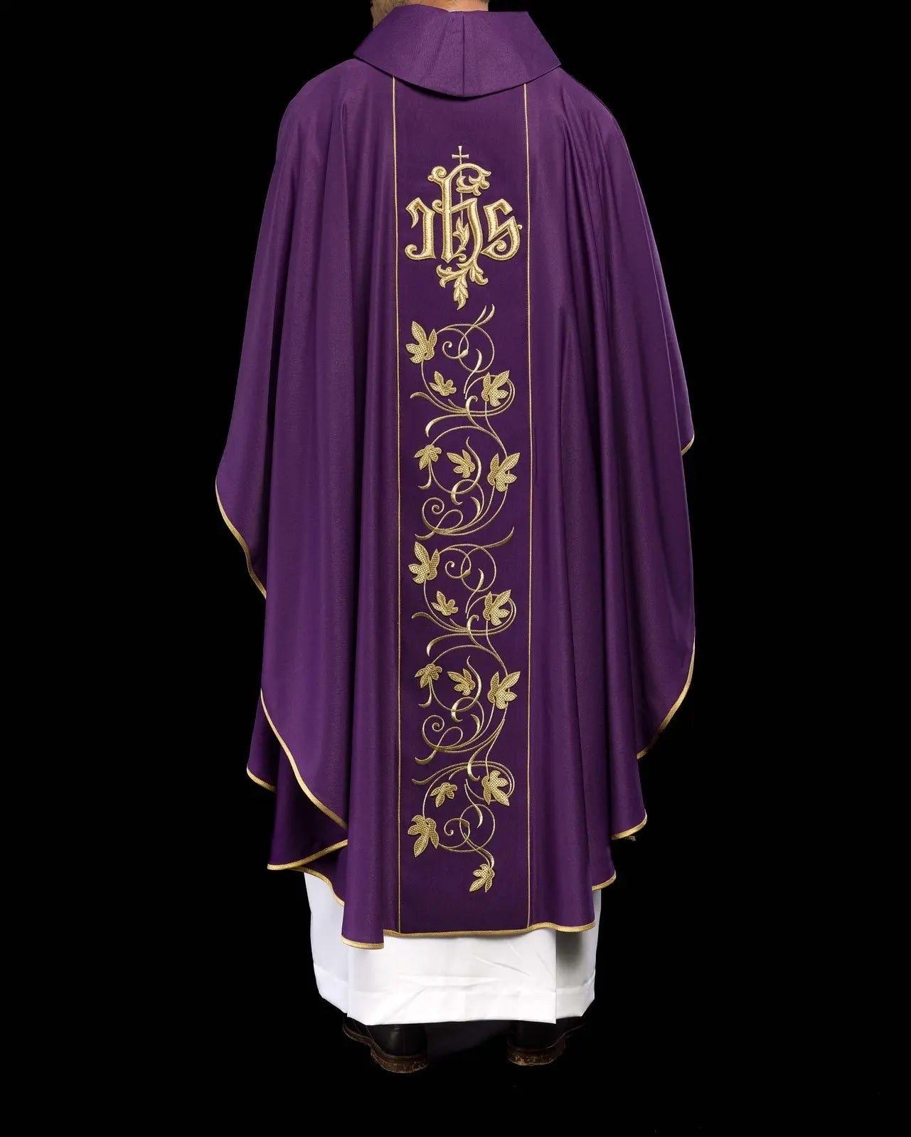 Purple liturgical chasuble with richly decorated belt with floral motif and IHS