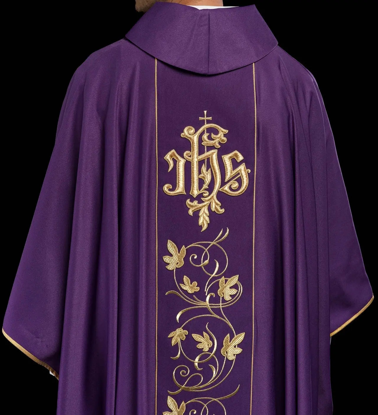 Purple liturgical chasuble with richly decorated belt with floral motif and IHS