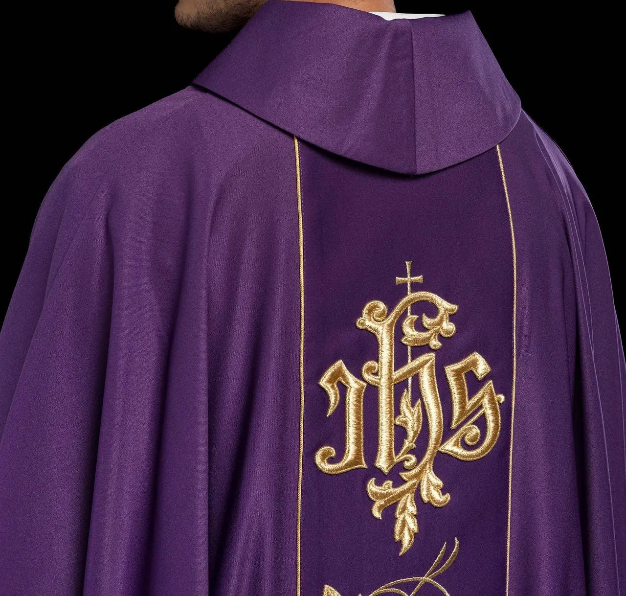 Purple liturgical chasuble with richly decorated belt with floral motif and IHS